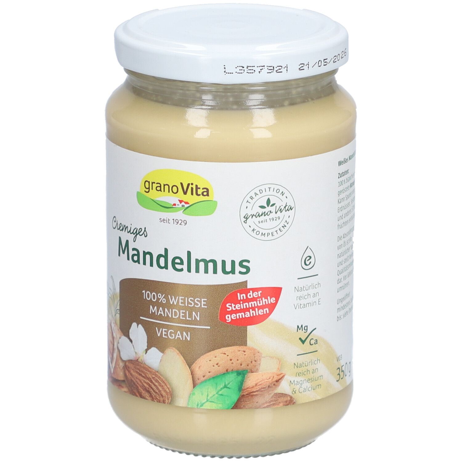 Glas mit Cremiges Mandelmousse. Aufschrift: granaVita, Mandelmuss, 100% weisse Mandeln, vegan. Abbildung von Mandeln. Zeichen für Vitamin E, Mg, Ca.