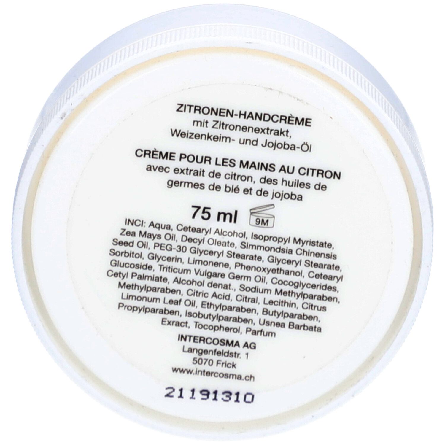 Unterseite eines weißen Tiegels mit Text. Zitronen-Handcreme, Inhaltsstoffe, Herstellerinformationen. Schwarze Schrift.