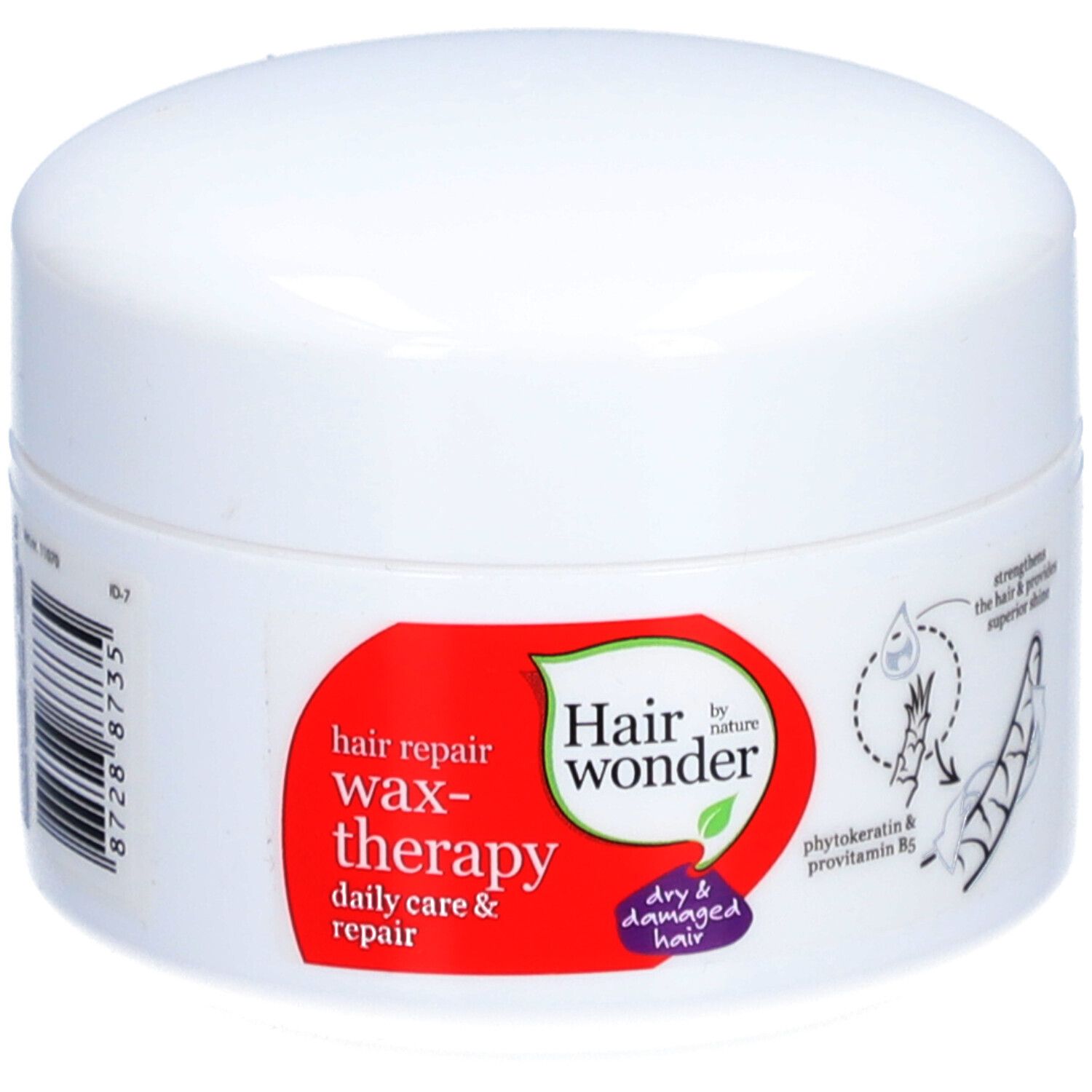 Pot blanc avec étiquette rouge. Inscription : Hairwonder Wax-thérapie. Contient de la phytokératine et de la provitamine B5. Pour cheveux secs et abîmés.
