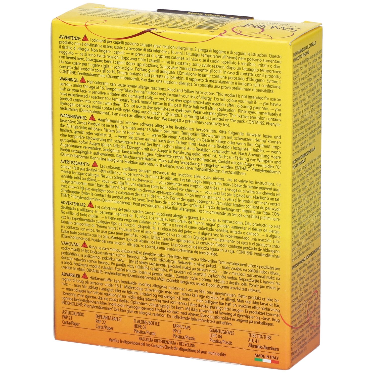 Gelbe Schachtel mit Warnhinweisen. Text in mehreren Sprachen. Enthält Informationen zu Allergien und Vorsichtsmaßnahmen. Hergestellt in Italien.