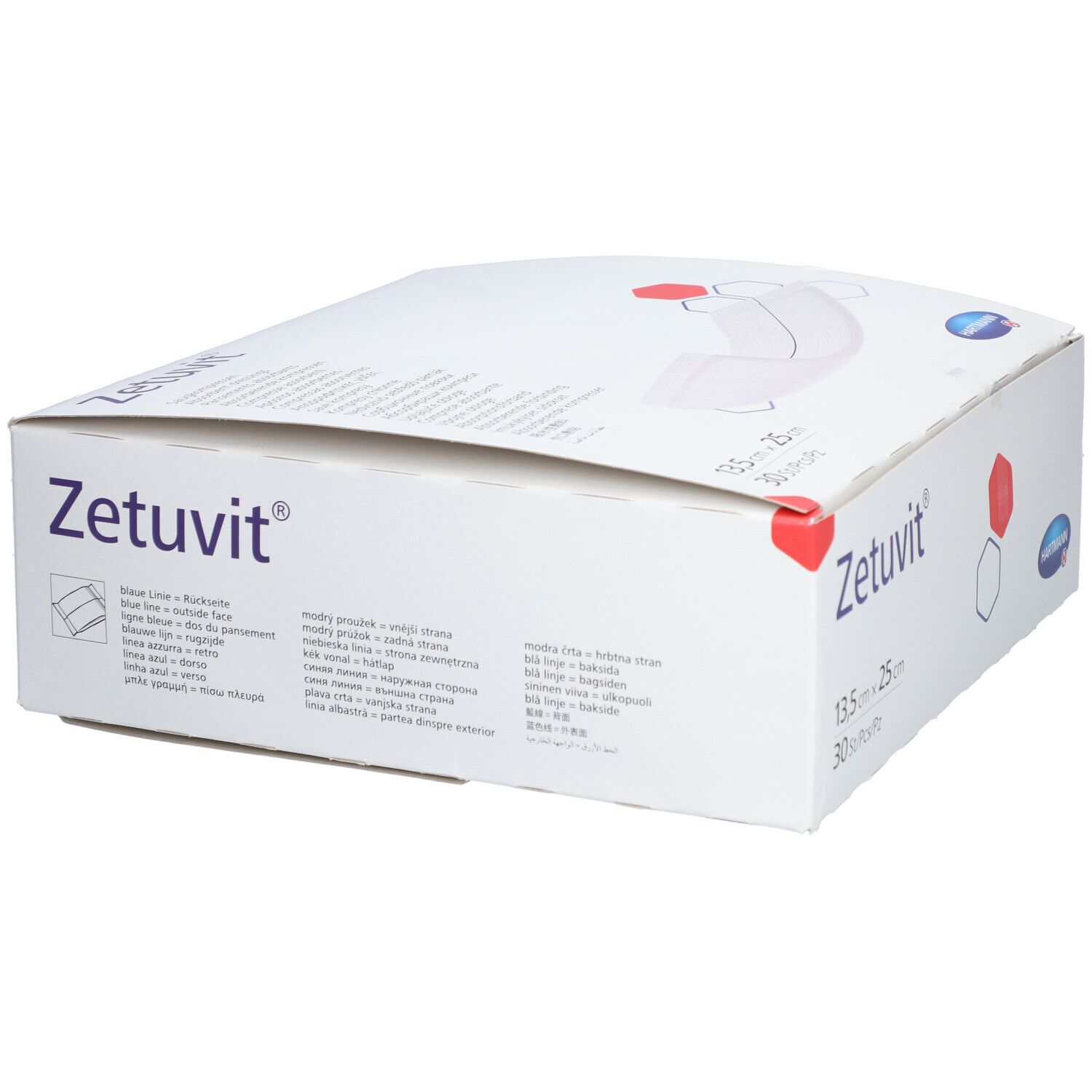 Boîte Zetuvit®. Boîte blanche avec nom du produit, dimensions et textes multilingues. Marque HARTMANN.