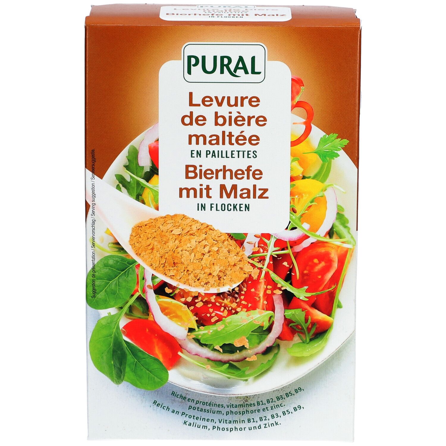 Boîte en carton marron avec nom du produit et image d'une salade avec flocons. Marque PURAL.