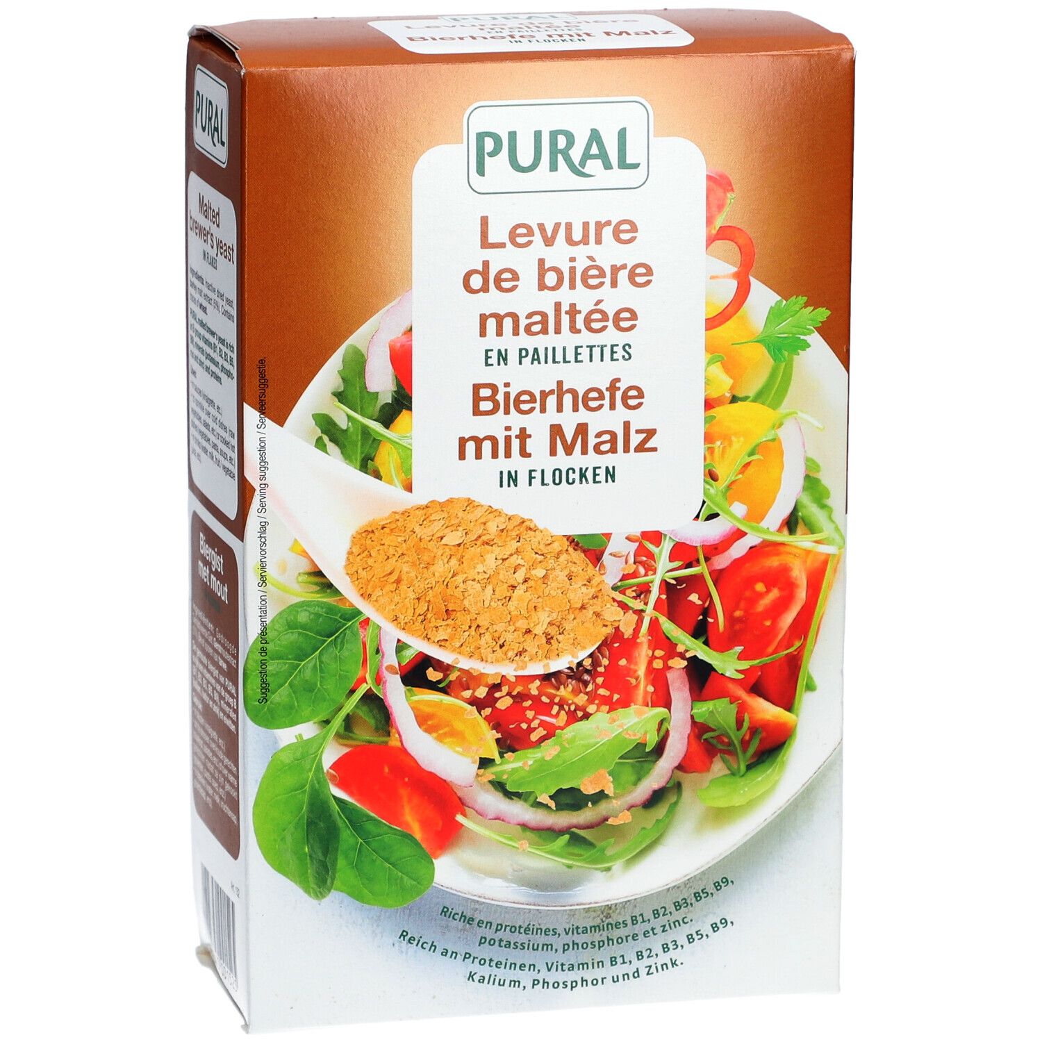 Boîte en carton marron avec nom du produit et image d'une salade avec flocons. Marque PURAL.