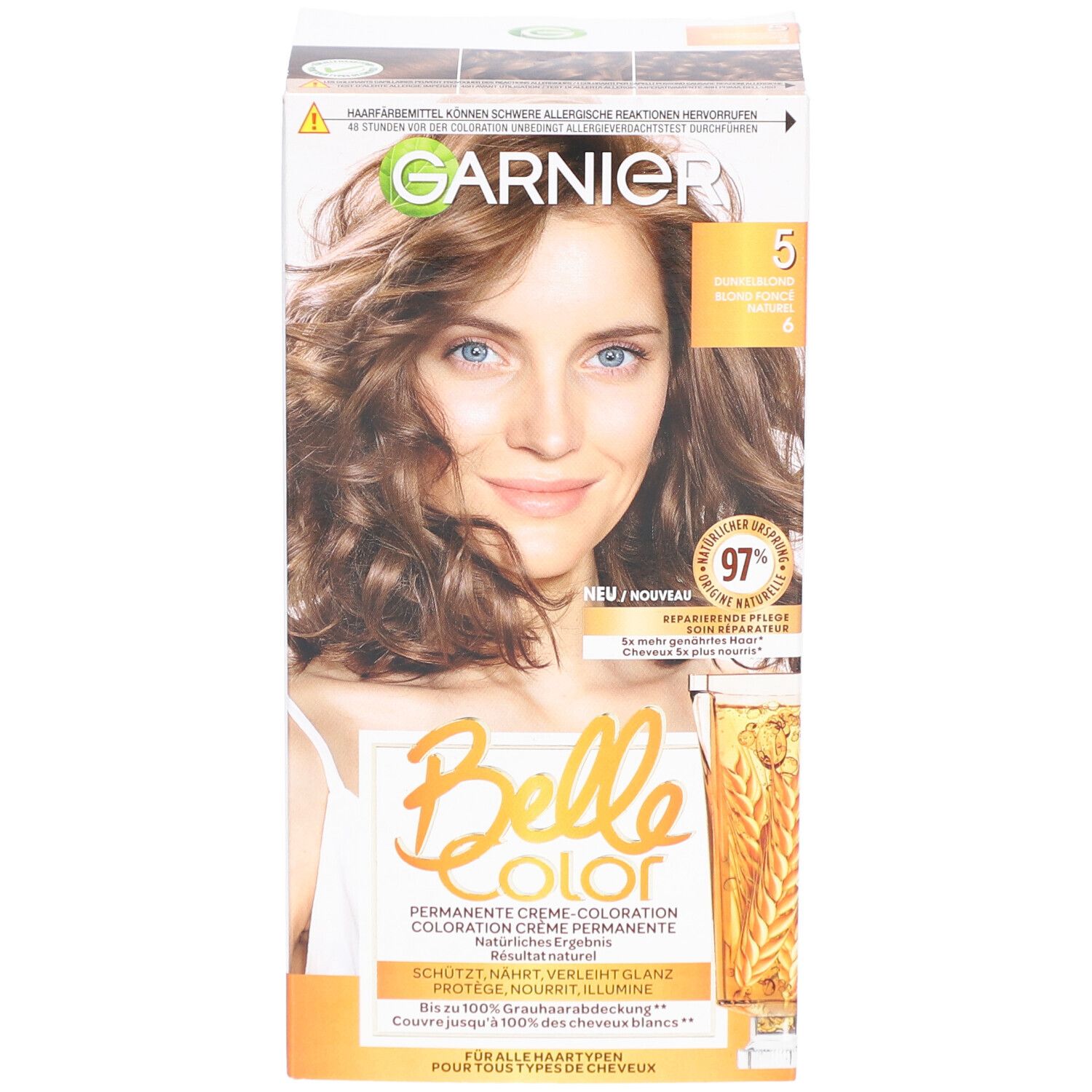 Garnier Belle Color-Verpackung, Vorderseite. Frau mit braunen Haaren. Aufdruck: 5, Dunkelblond, 97% natürliche Inhaltsstoffe. Neu/Nouveau.
