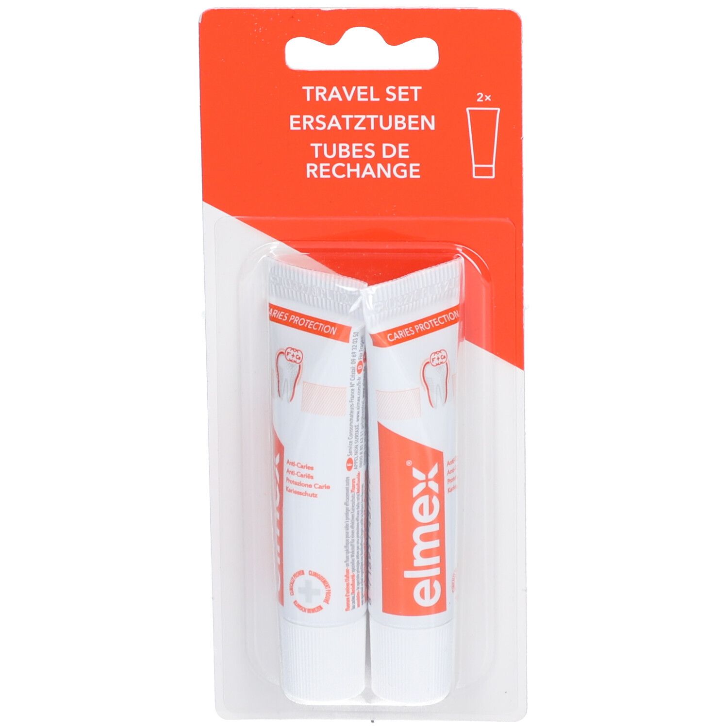 Deux tubes blancs dans un emballage orange. Inscription: elmex, Travel Set, Tubes de recharge.