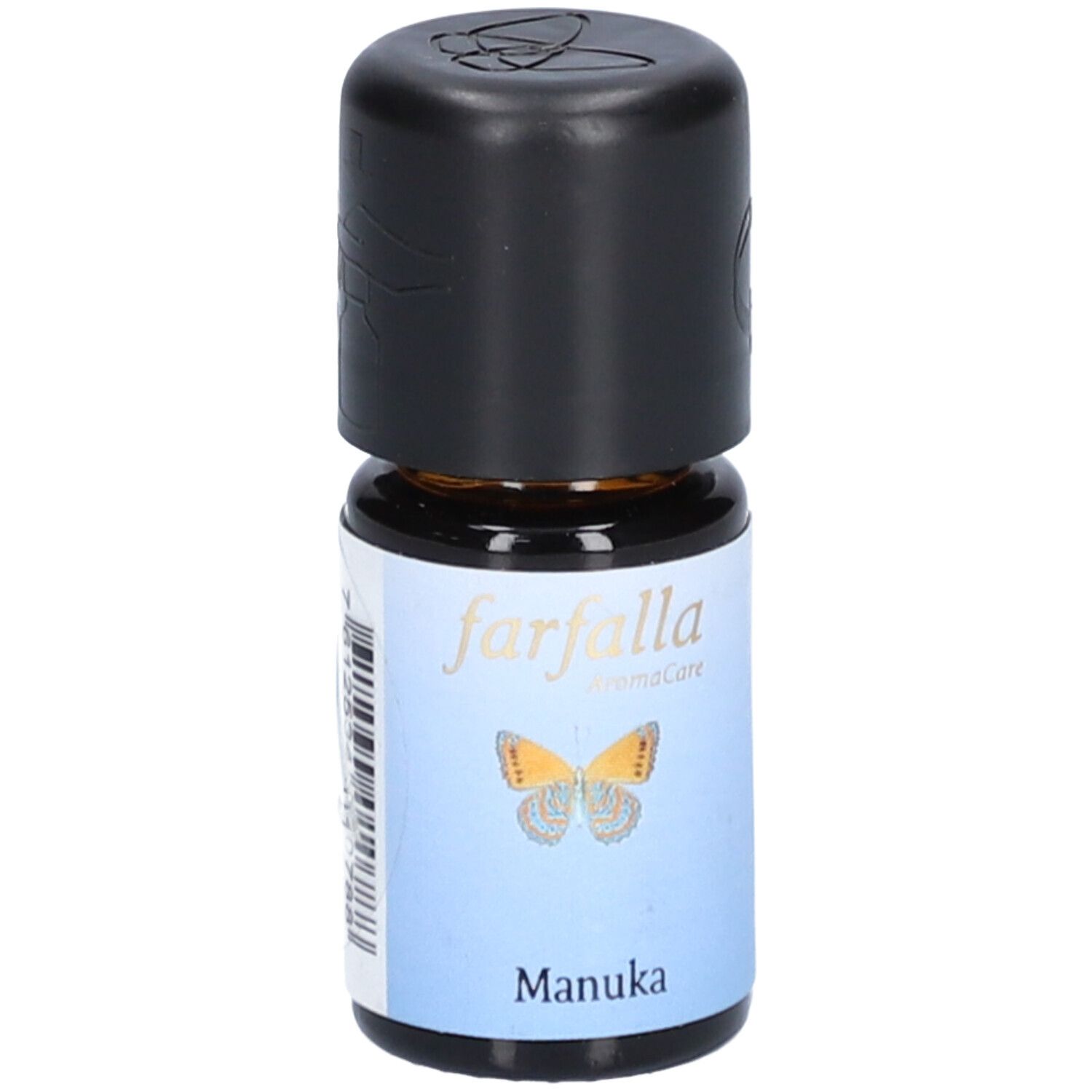 Braune Glasflasche mit schwarzem Deckel. Etikett mit Schmetterling und Schriftzug "Manuka".