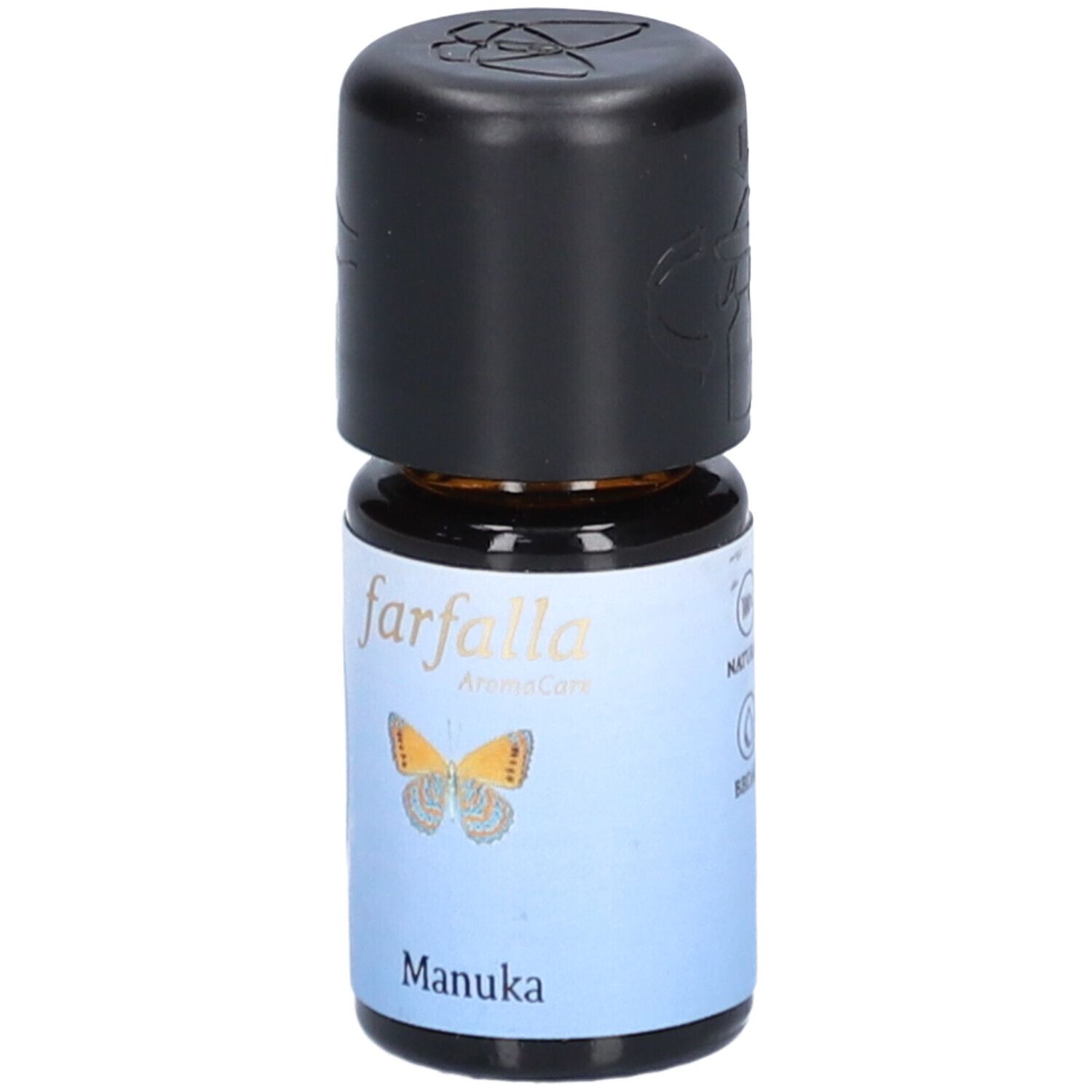 Braune Glasflasche mit schwarzem Deckel. Etikett mit Schmetterling und Schriftzug "Manuka".
