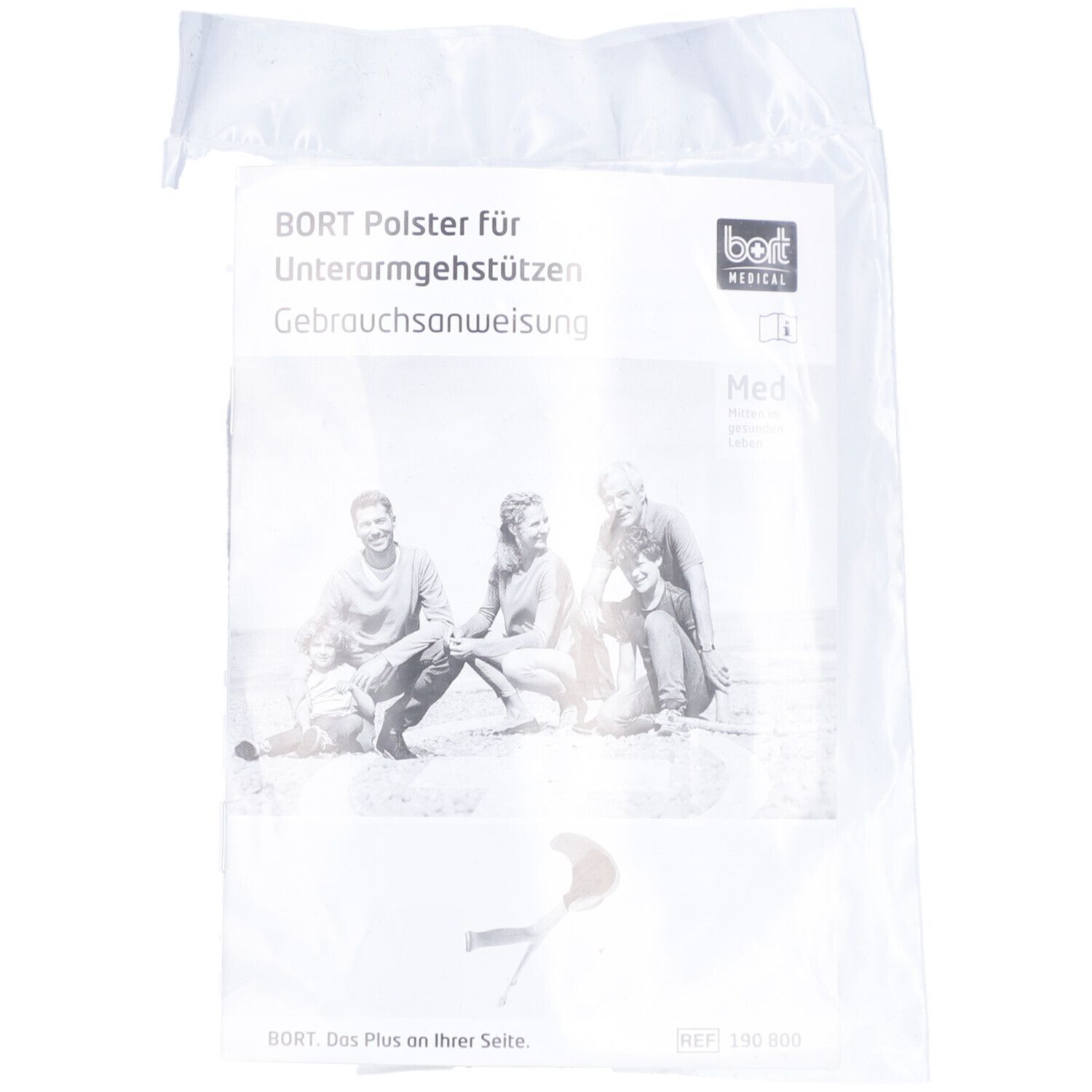Emballage avec mode d'emploi pour coussinets de béquilles. Marque BORT MEDICAL. Image d'une famille.
