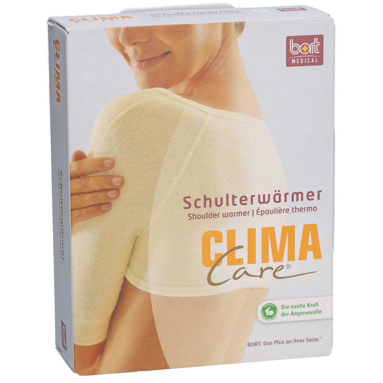 Verpakking met schouderwarmer. Opschrift: CLIMA Care, BORT MEDICAL. Productafbeelding: schouderwarmer, wit.