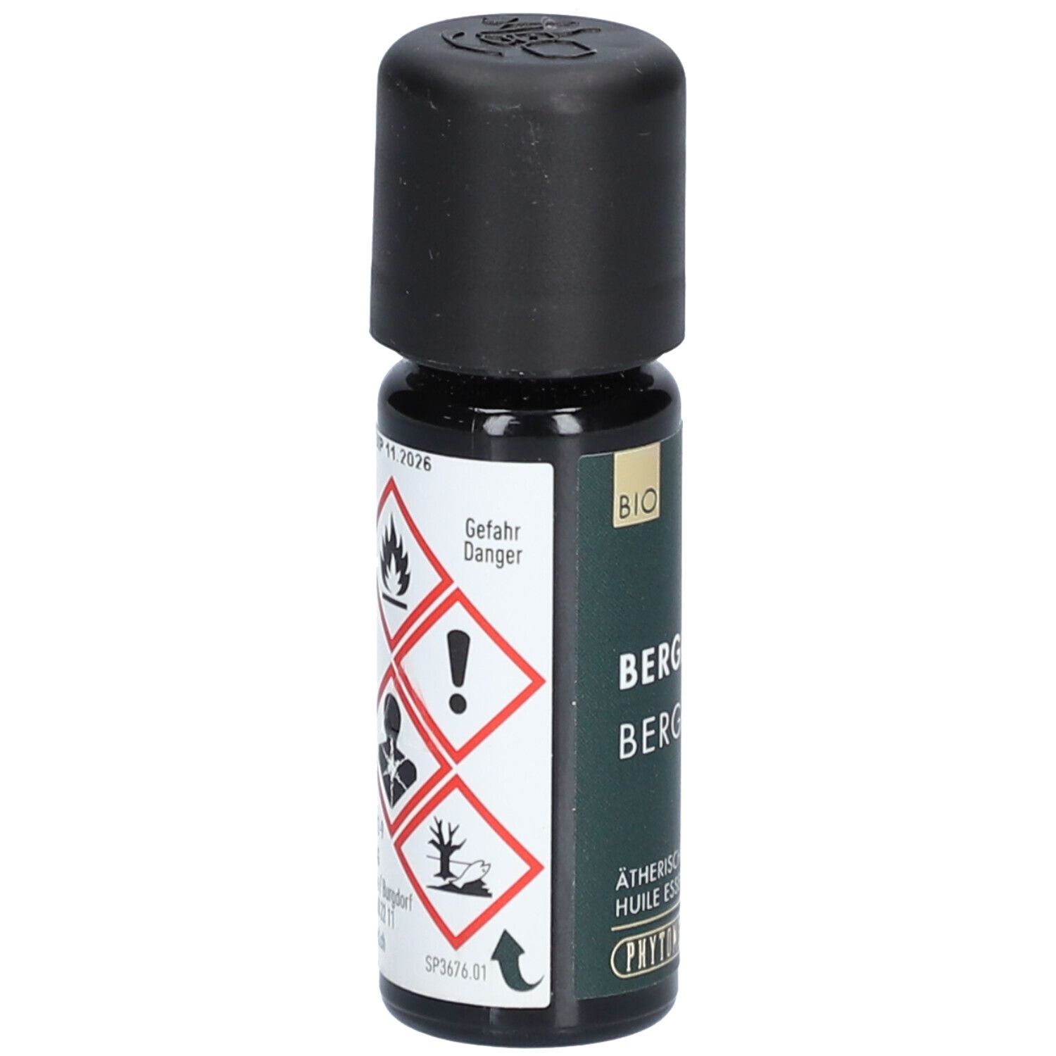 Kleine Glasflasche mit schwarzem Deckel. Aufschrift: BERGAMOTTE. Gefahrensymbole. Marke: PHYTOMED.