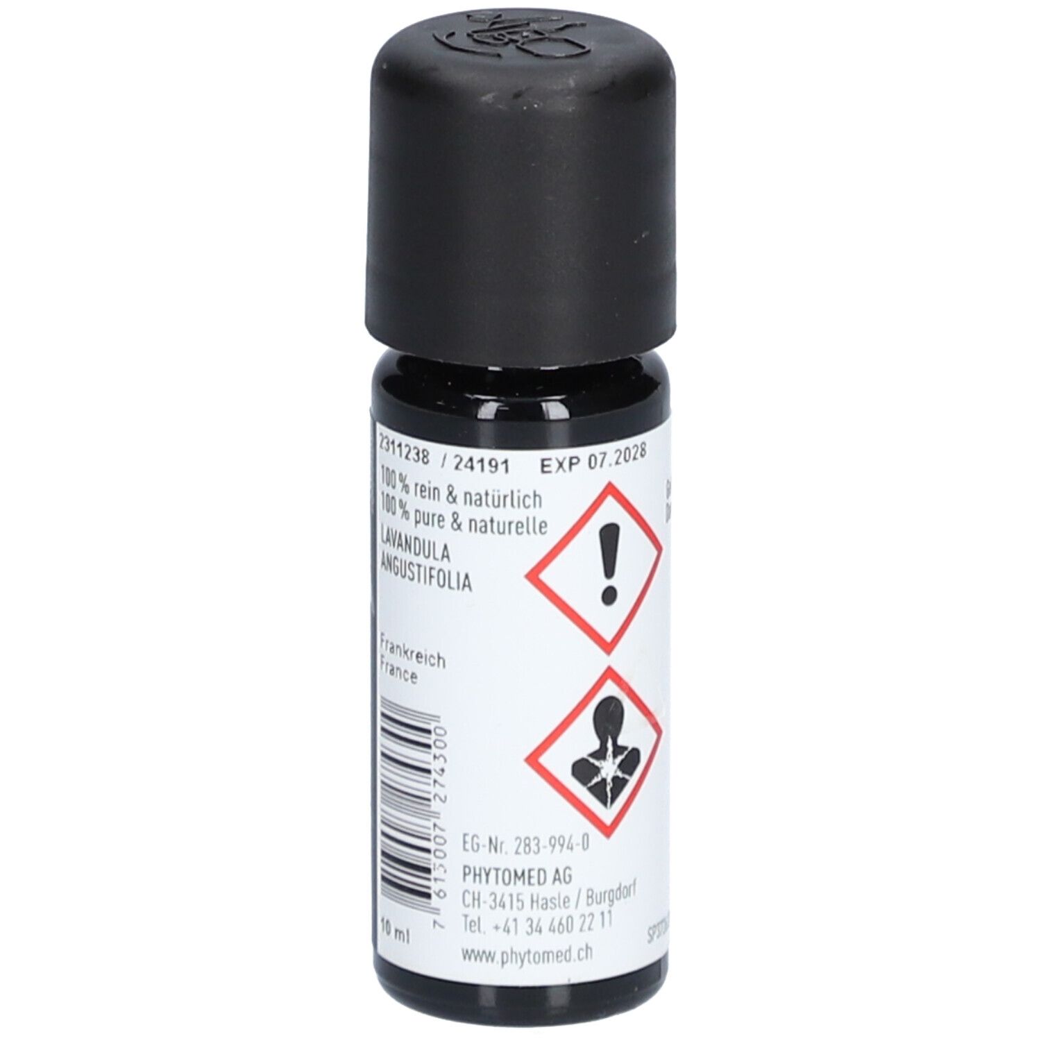 Flacon en verre brun avec bouchon noir. Étiquette avec texte, symboles de danger et numéro de lot. Huile essentielle.
