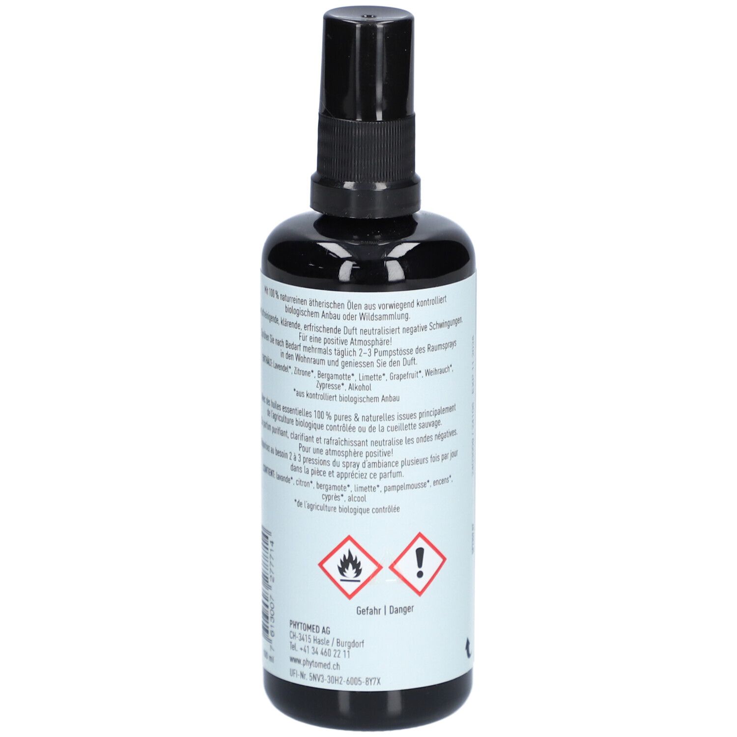 Flacon noir avec vaporisateur. Étiquette avec texte sur les ingrédients et avertissements. Symboles de danger.