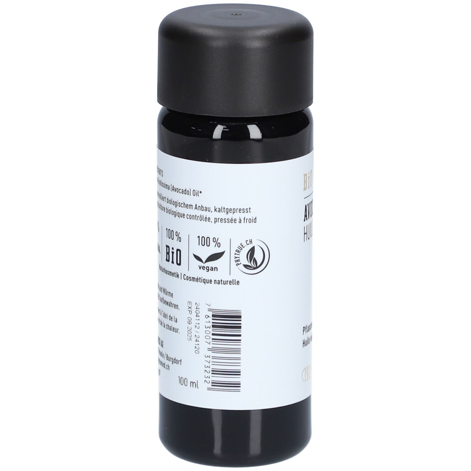Zwarte fles met etiket. Opschrift: AVOCADOÖL, HUILE D'AVOCAT. Bio-label, vegan. Ingrediënten, lotnummer.