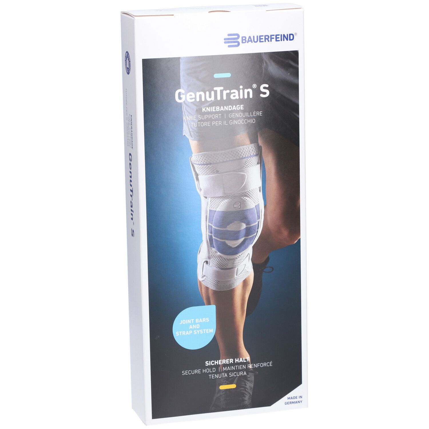 Kniebandage in Verpackung. Marke: BAUERFEIND. Produktname: GenuTrain S. Text: Kniebandage, Joint Bar and Strap System, Sicherer Halt.