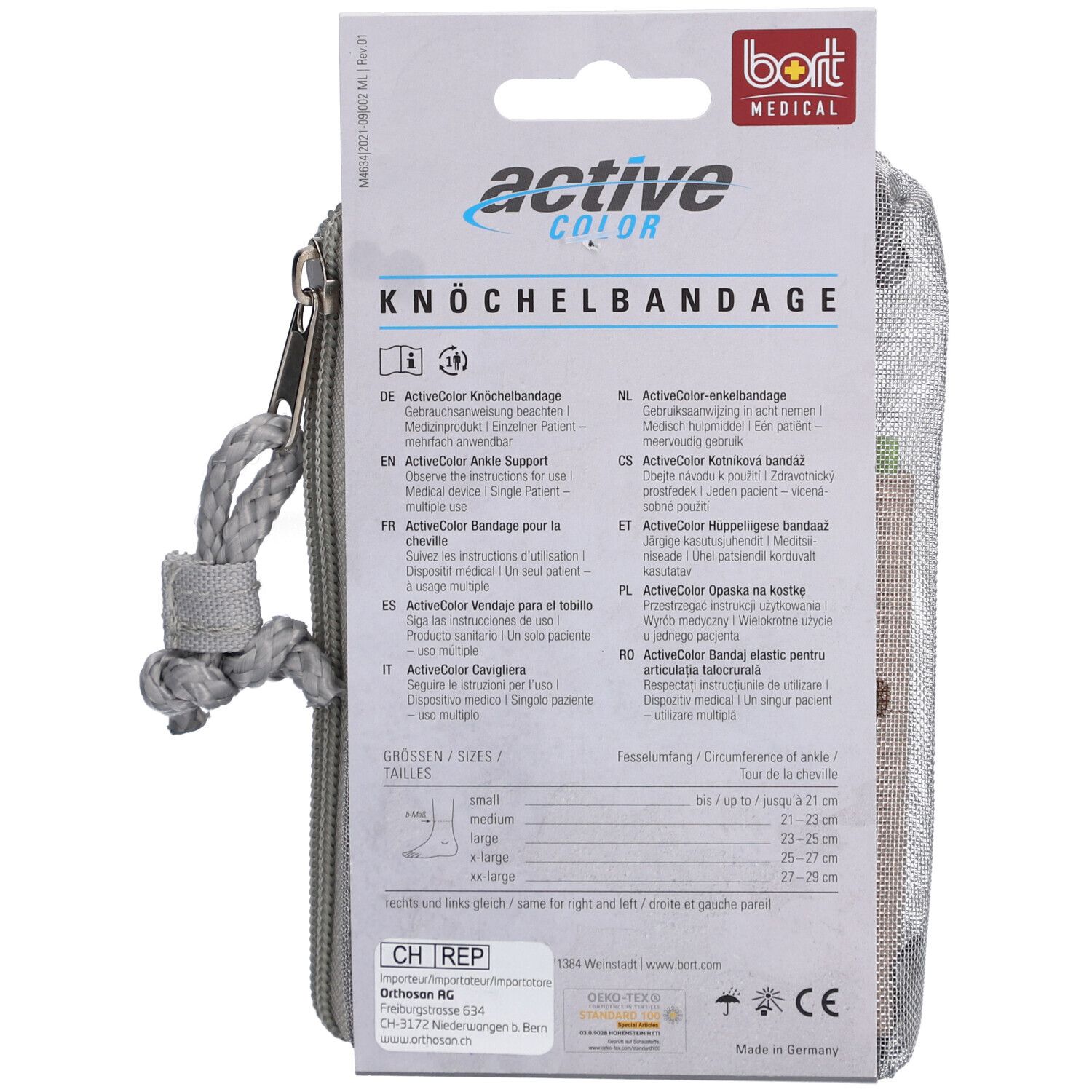 Rückseite der Verpackung. Produktname, Größenangaben, Gebrauchsanweisung. Grau-weißes Etui mit Reißverschluss und Kordel.