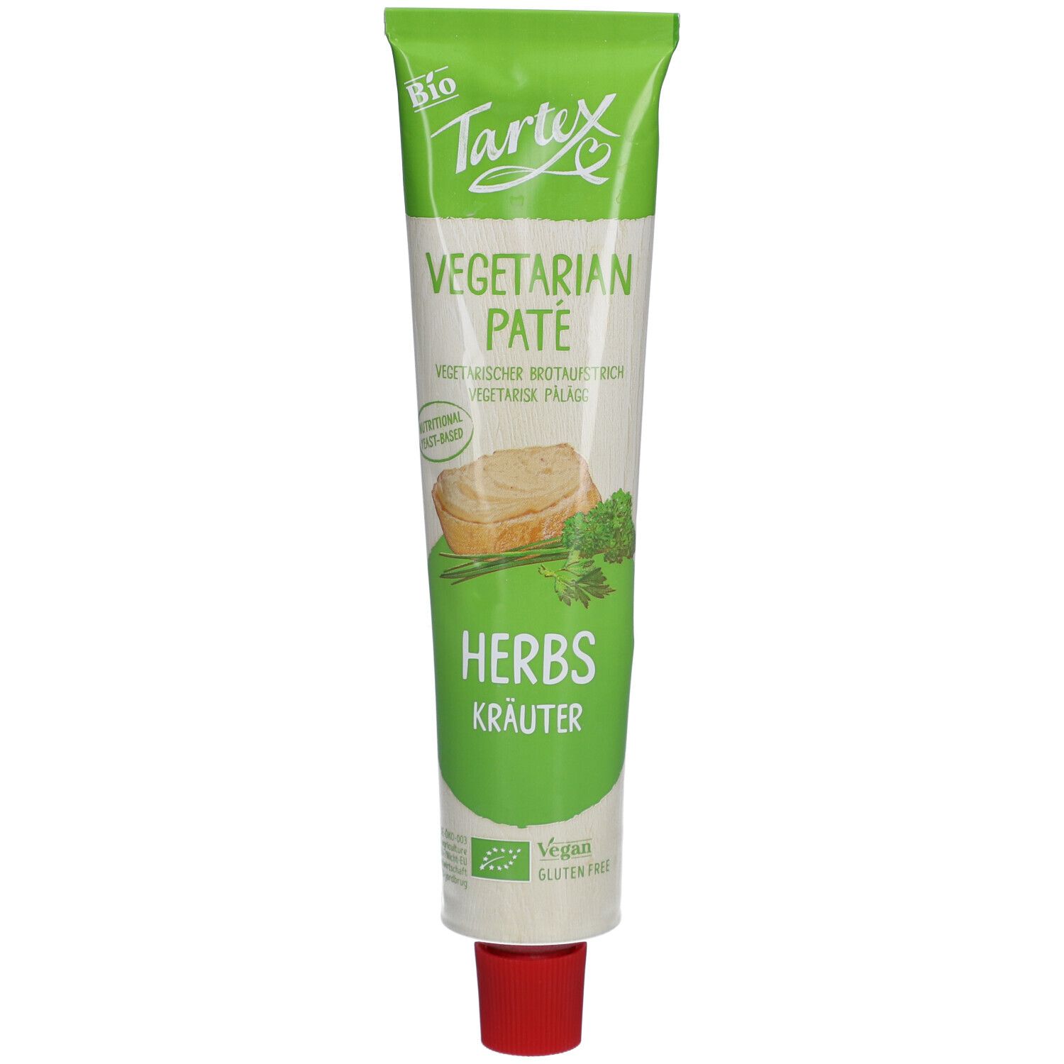 Grüne Tube mit Aufschrift Tartex, vegetarische Pastete mit Kräutern. Bio-Siegel, vegan und glutenfrei.
