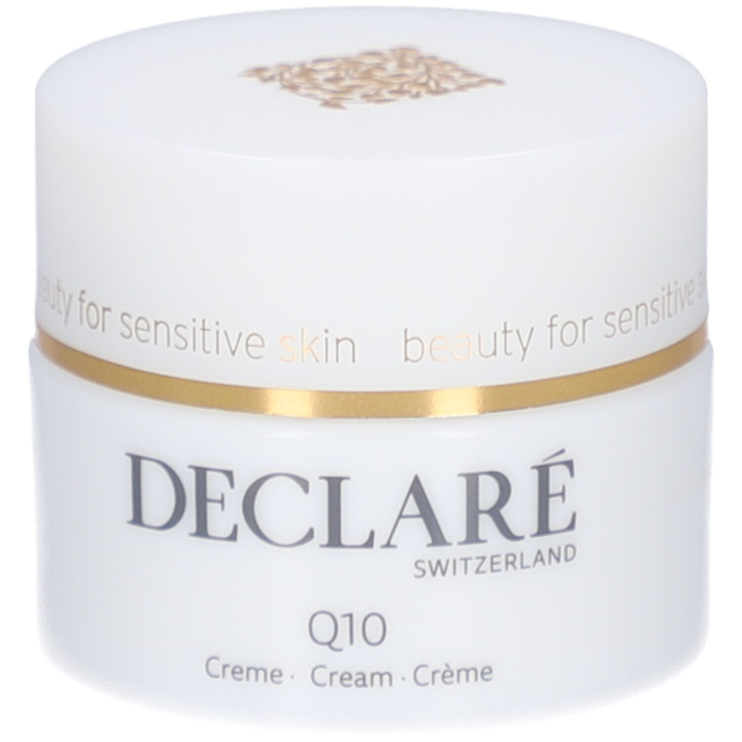 Weißes Creme-Glas mit goldfarbenem Deckelrand. Aufschrift: DECLARÉ, Q10, Creme. Logo auf dem Deckel.