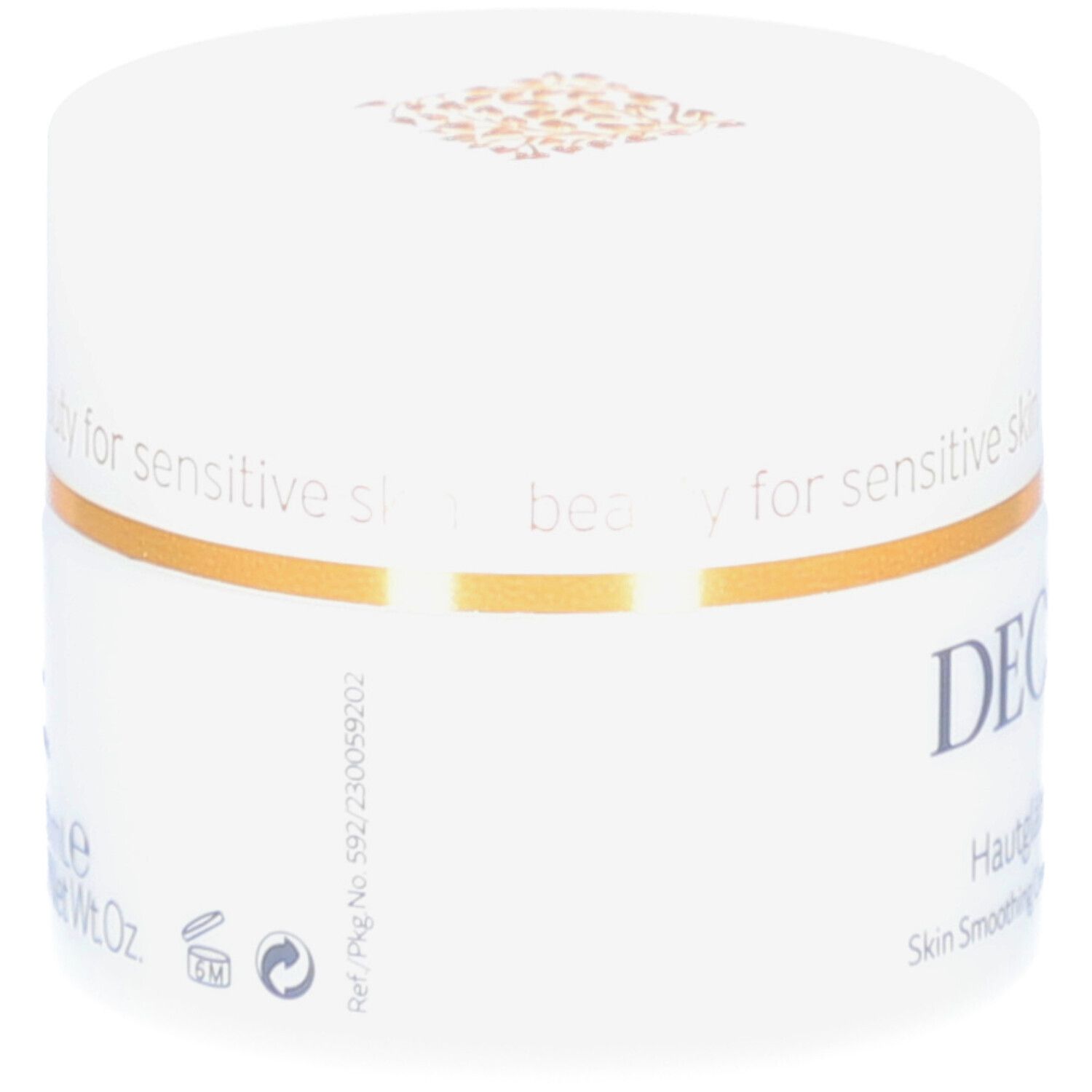 Weißer Tiegel mit Deckel. Goldener Zierstreifen. DECLARÉ-Logo und Produktbezeichnung. Aufschrift: Hautglättungs Creme.