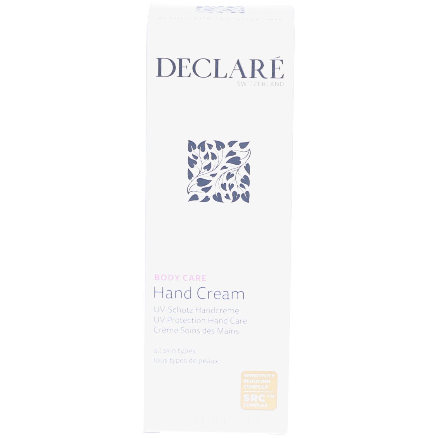 Weiße Produktverpackung. Aufschrift: DECLARÉ, Hand Cream, UV-Schutz Handcreme. Baum-Logo. SBC-Qualitätszeichen.