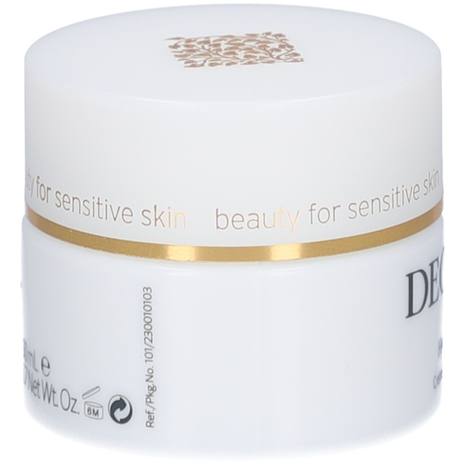 Weißer Creme-Tiegel mit Deckel. Goldener Ring. Aufschrift: DECLARÉ. Rückseite mit Text und Symbolen.