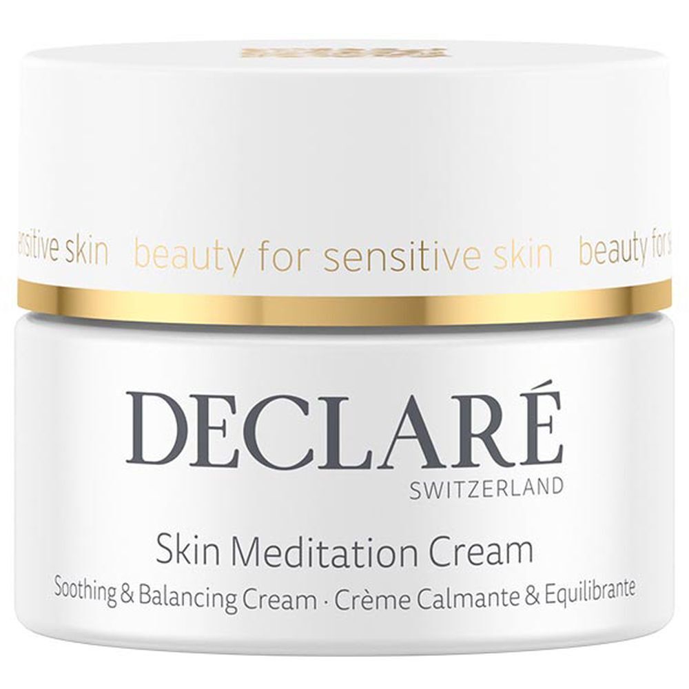 Weißes Creme-Tiegel mit goldenem Rand. Aufschrift: DECLARÉ SWITZERLAND, Skin Meditation Cream. Beruhigende & ausgleichende Creme.