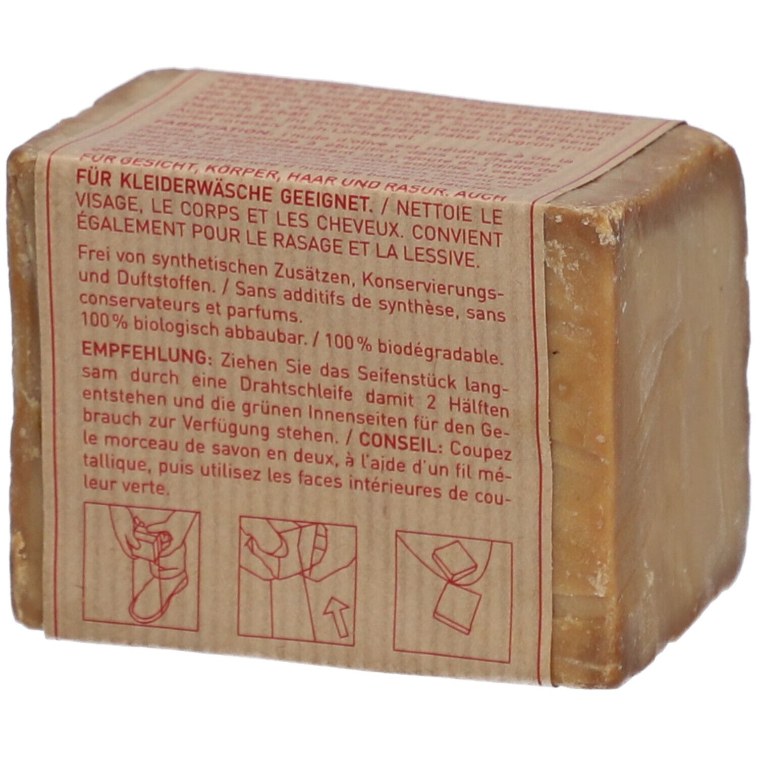 Rechteckige Seife mit Papierbanderole. Text: Für Kleiderwäsche geeignet. 100% biologisch abbaubar. Anweisungen zum Teilen.