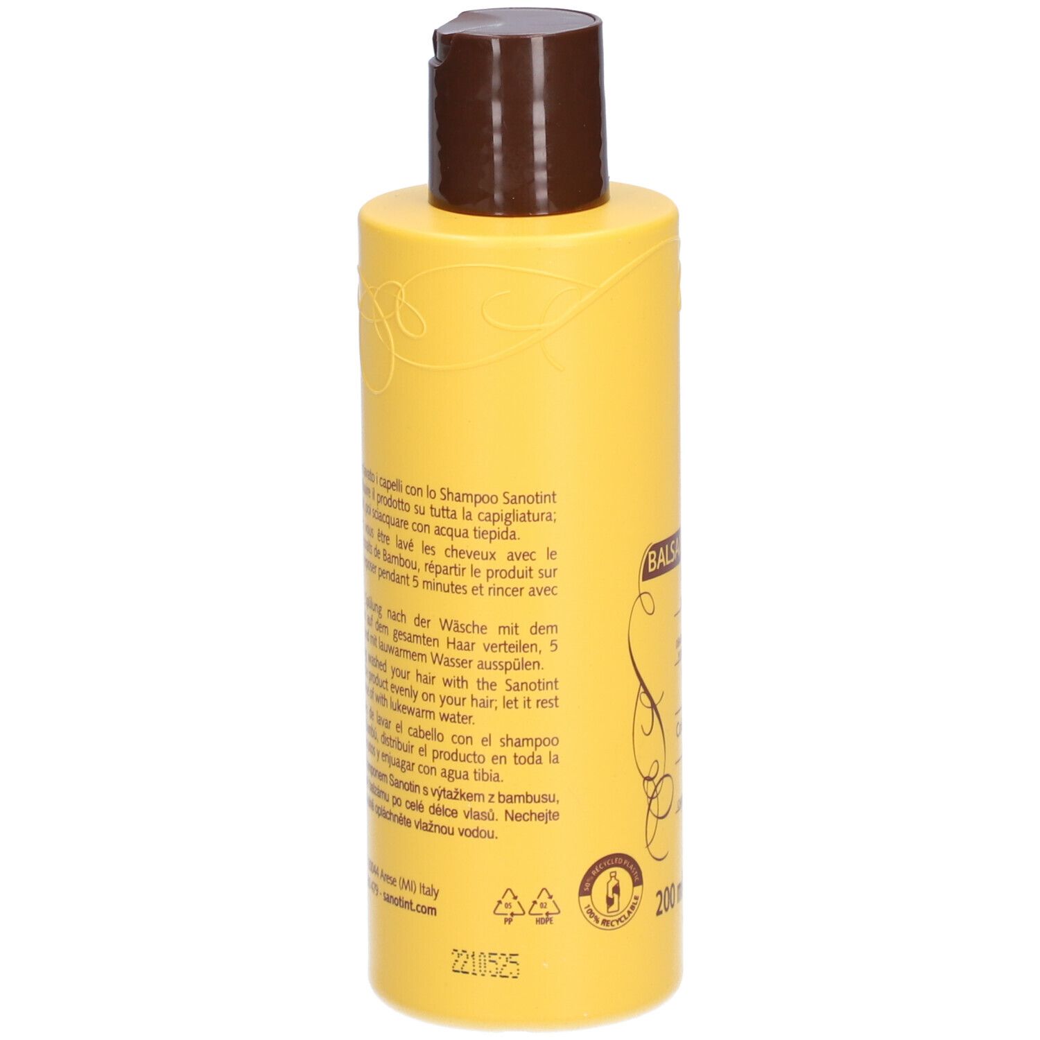 Flacon jaune, bouchon marron. Dos avec texte multilingue. 200 ml.