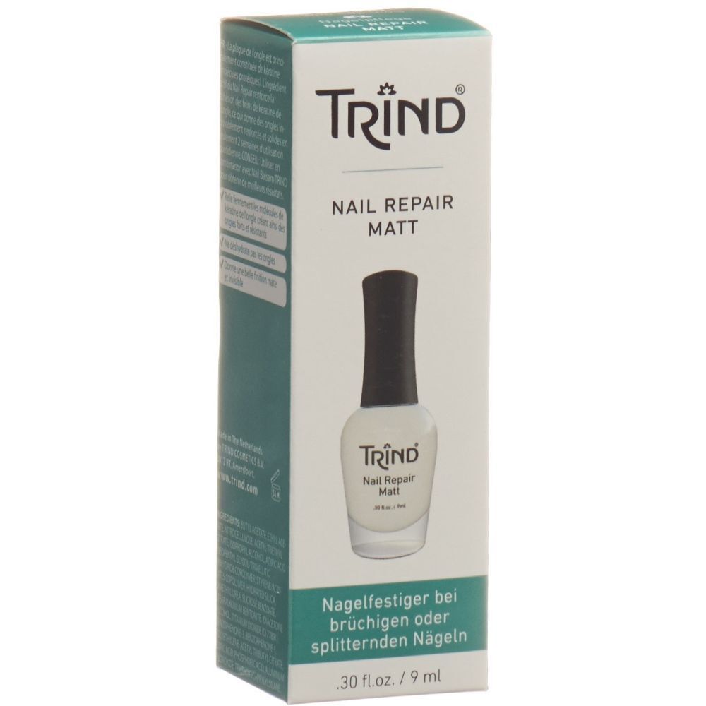 Boîte avec flacon de vernis à ongles. Inscription : TRIND, Nail Repair Matt. Flacon avec bouchon noir, vernis blanc.