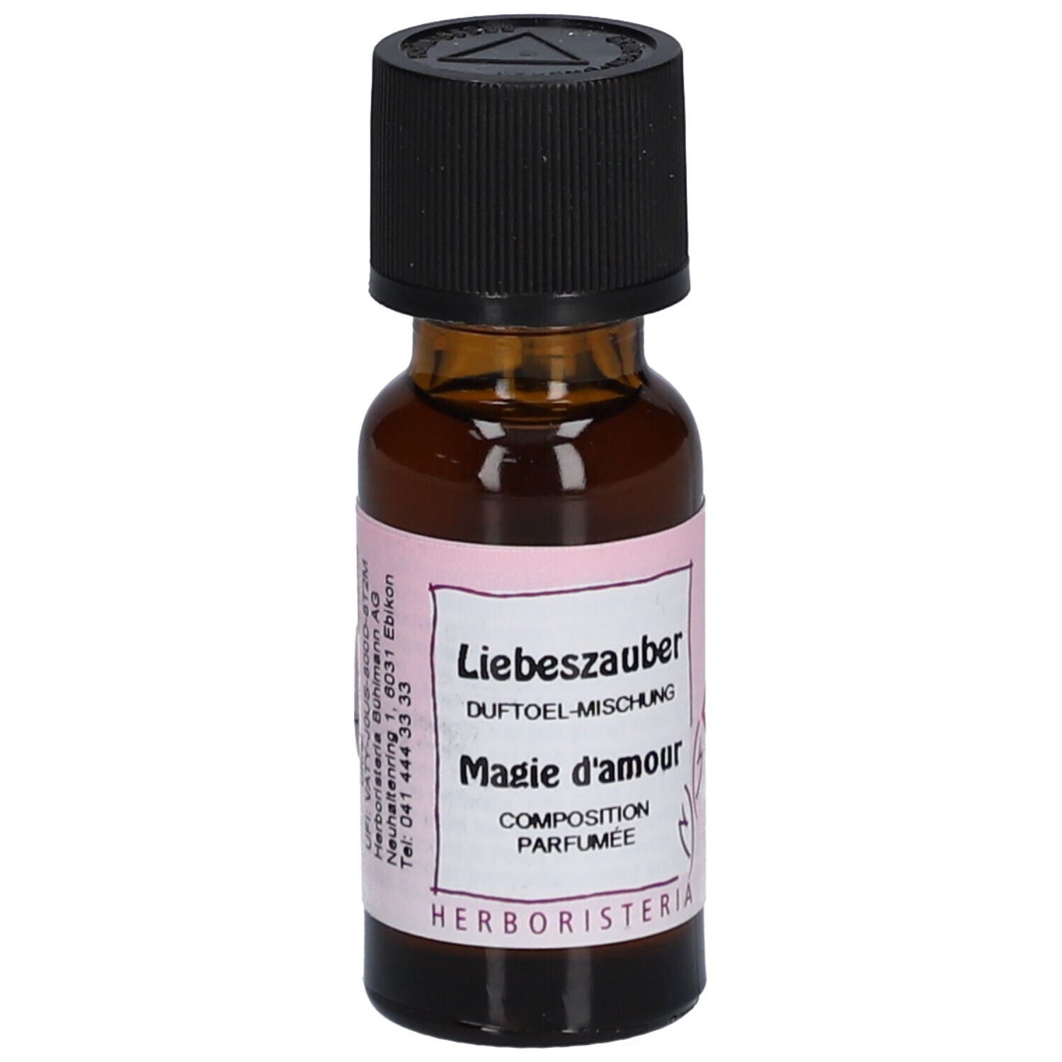 Flacon en verre brun avec bouchon noir. Étiquette avec texte: Liebeszauber, Magie d'amour, HERBORISTERIA.