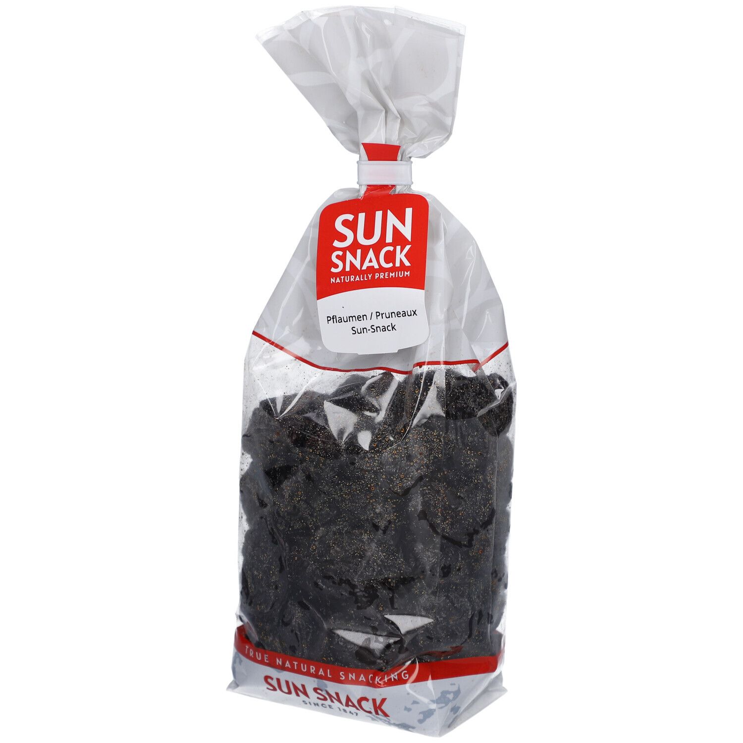 Klarsichtbeutel mit getrockneten Pflaumen. Rotes Etikett mit SUN SNACK-Logo. Text: Pflaumen/Pruneaux. Natürlicher Snack.