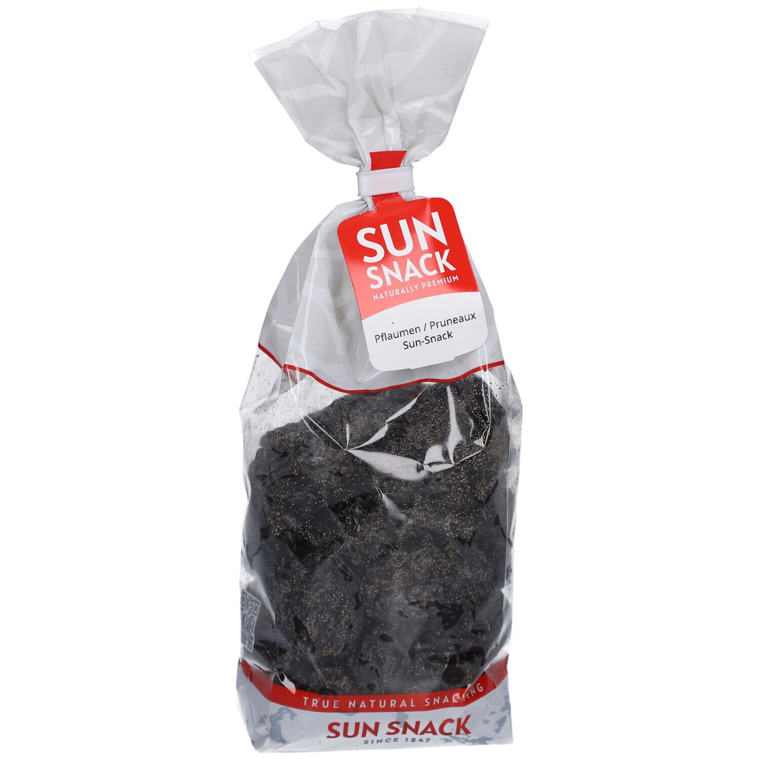 Klarsichtbeutel mit getrockneten Pflaumen. Rotes Etikett mit SUN SNACK-Logo. Text: Pflaumen/Pruneaux. Natürlicher Snack.