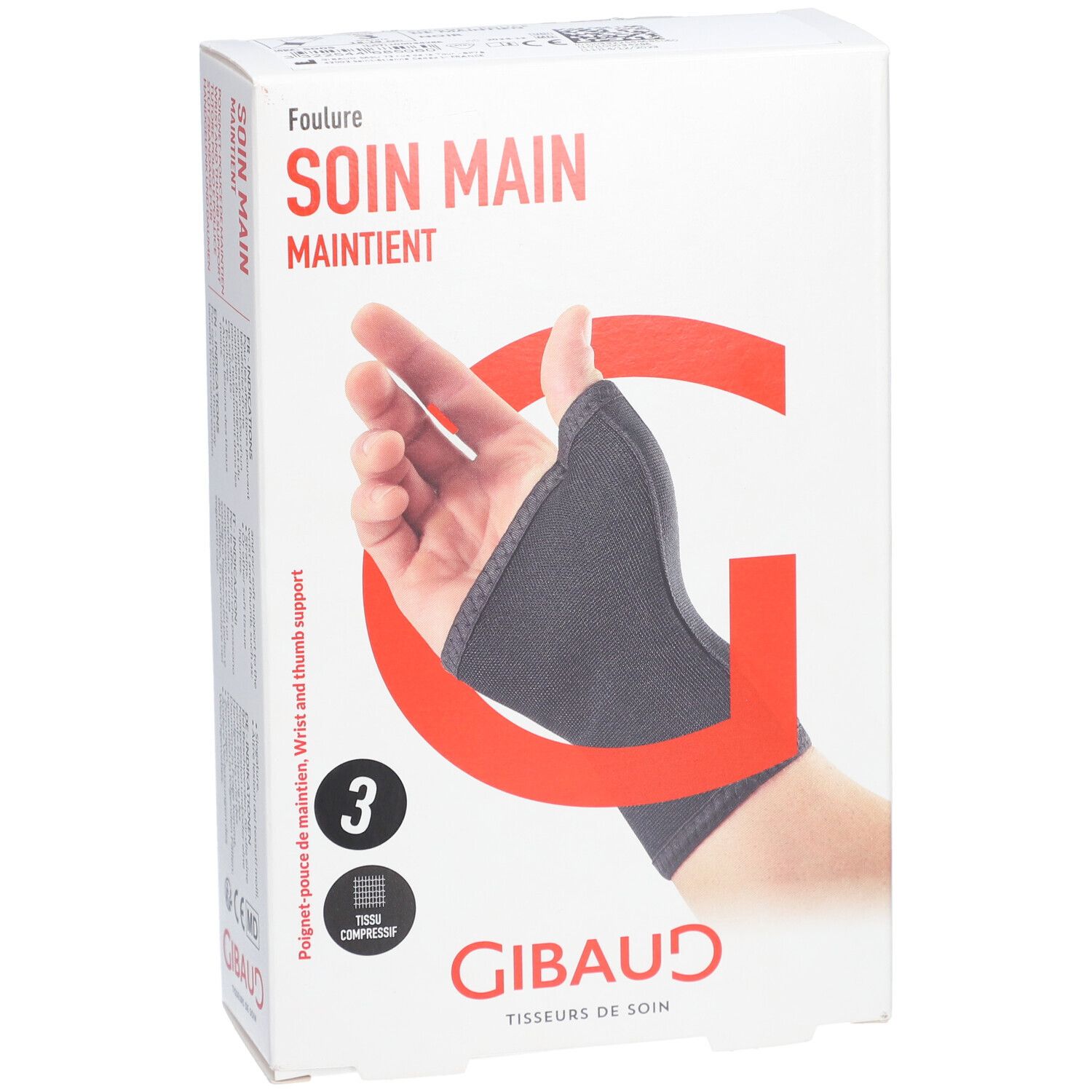 Orthèse de maintien main taille 3, en boîte. La main porte l'orthèse grise. Marque GIBAUD.