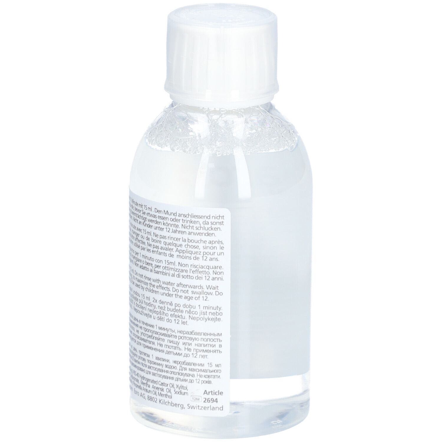 Fles met witte dop. Achterkant met tekst in meerdere talen. Productinformatie.