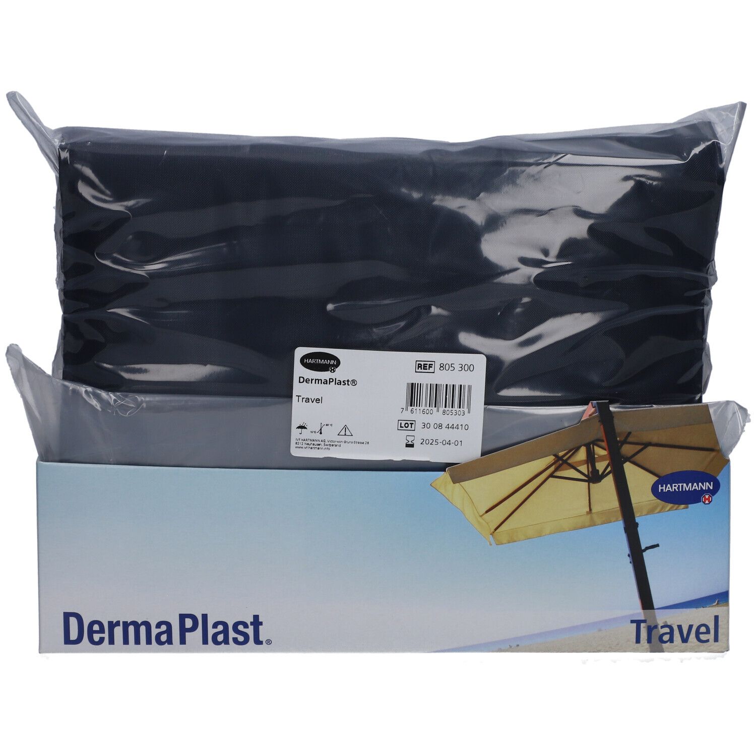 Schwarze Tasche in Folie, in einem weißen Karton. Auf dem Karton steht "Dermaplast. Travel" und ein Bild eines Sonnenschirms.