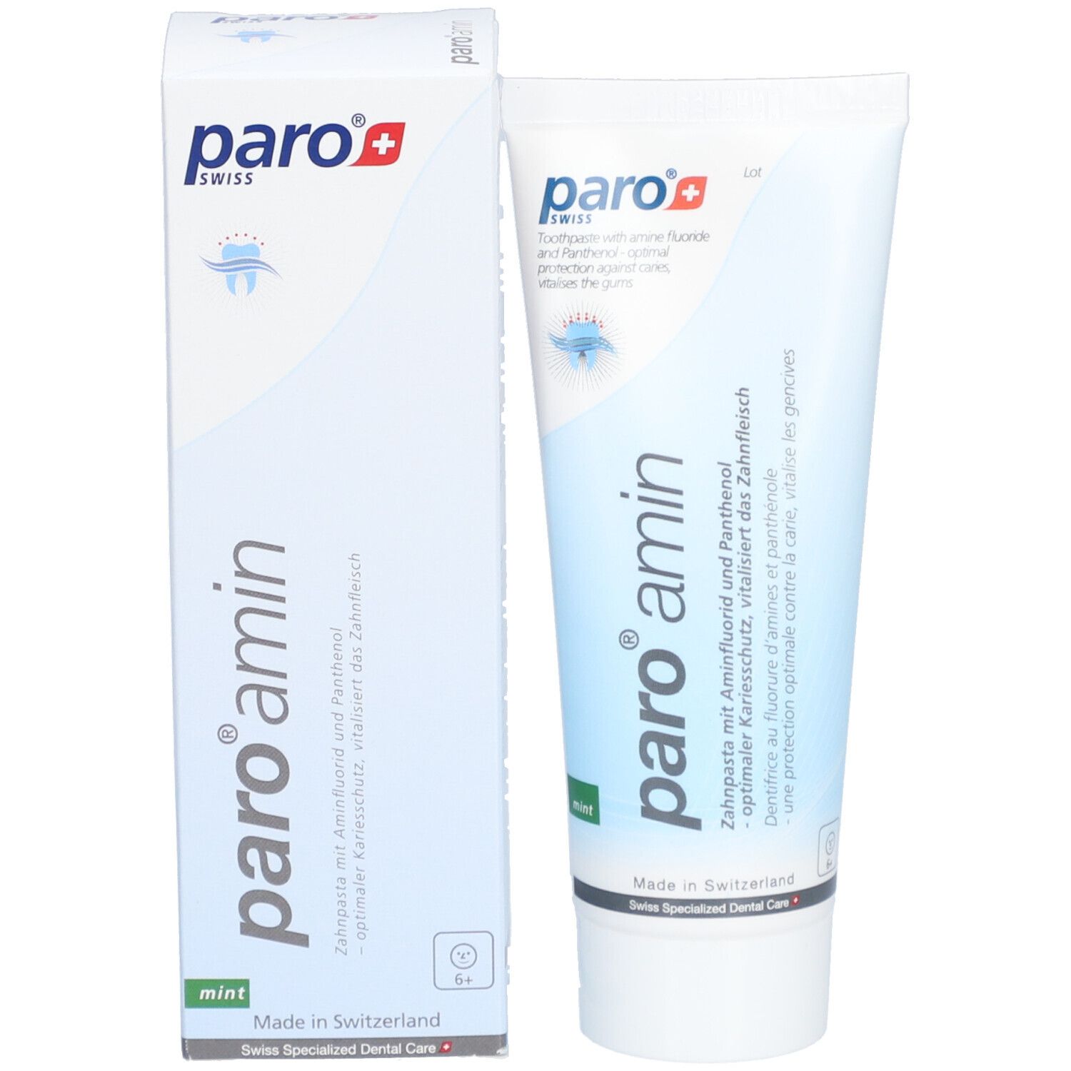 Zahncreme-Tube und Schachtel. Weiß mit blauer und grüner Schrift. Marke: paro. Enthält Aminfluorid und Panthenol.