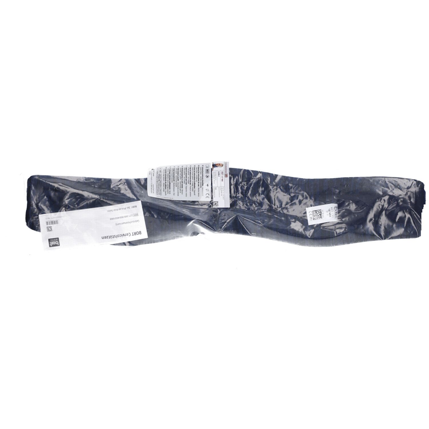 Coussin cervical emballé. Étiquettes avec informations produit. Produit noir.