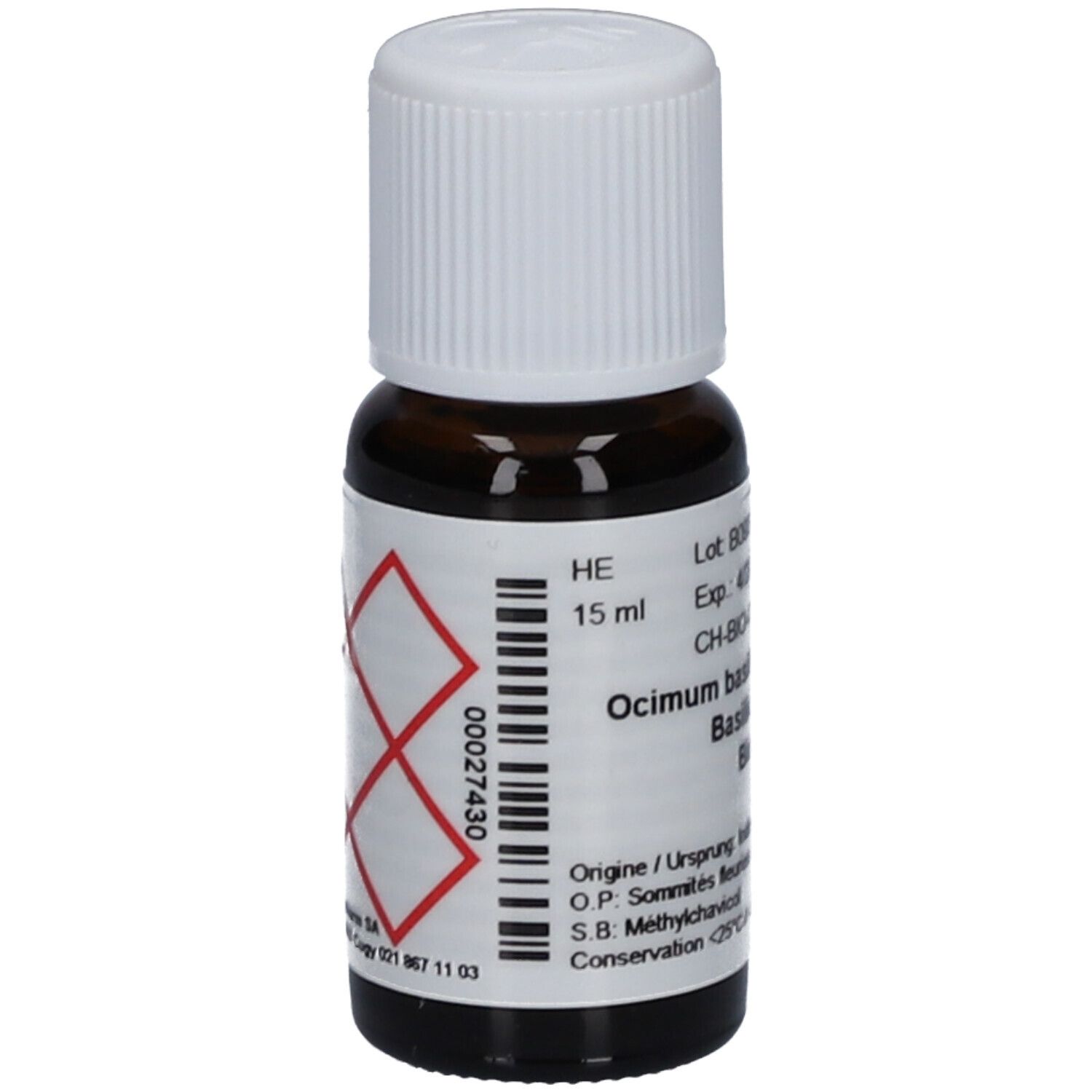 Braune Glasflasche mit weißem Deckel. Etikett mit Text: Ocimum basilicum, Bio Basilikum. Gefahrensymbol. 15 ml.