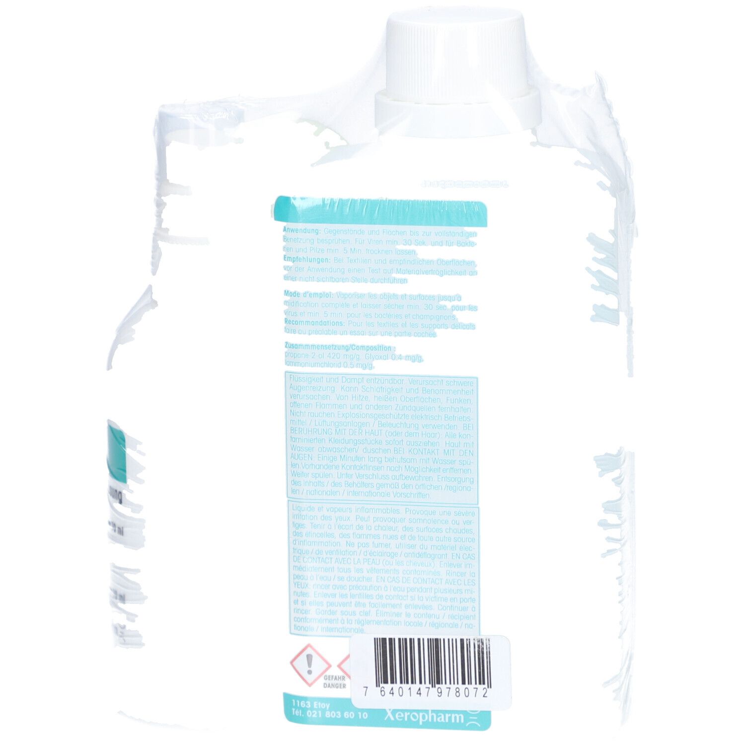 Rückseite der großen Flasche. Text und Barcode. Beide Flaschen sind in Folie verpackt.