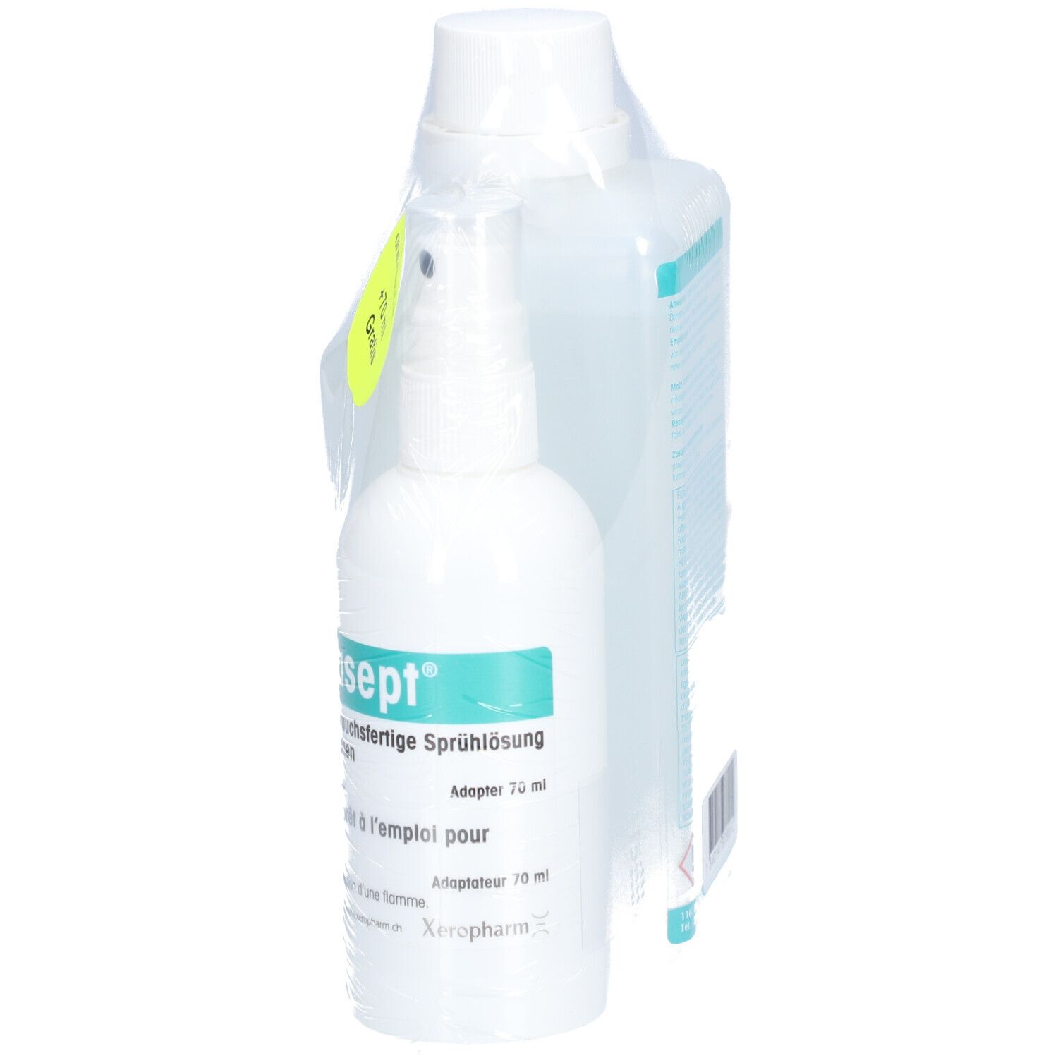 Zwei Flaschen in Folie verpackt. Kleine Sprühflasche mit "pantasept". Aufkleber mit Text. Rückseite der großen Flasche sichtbar.