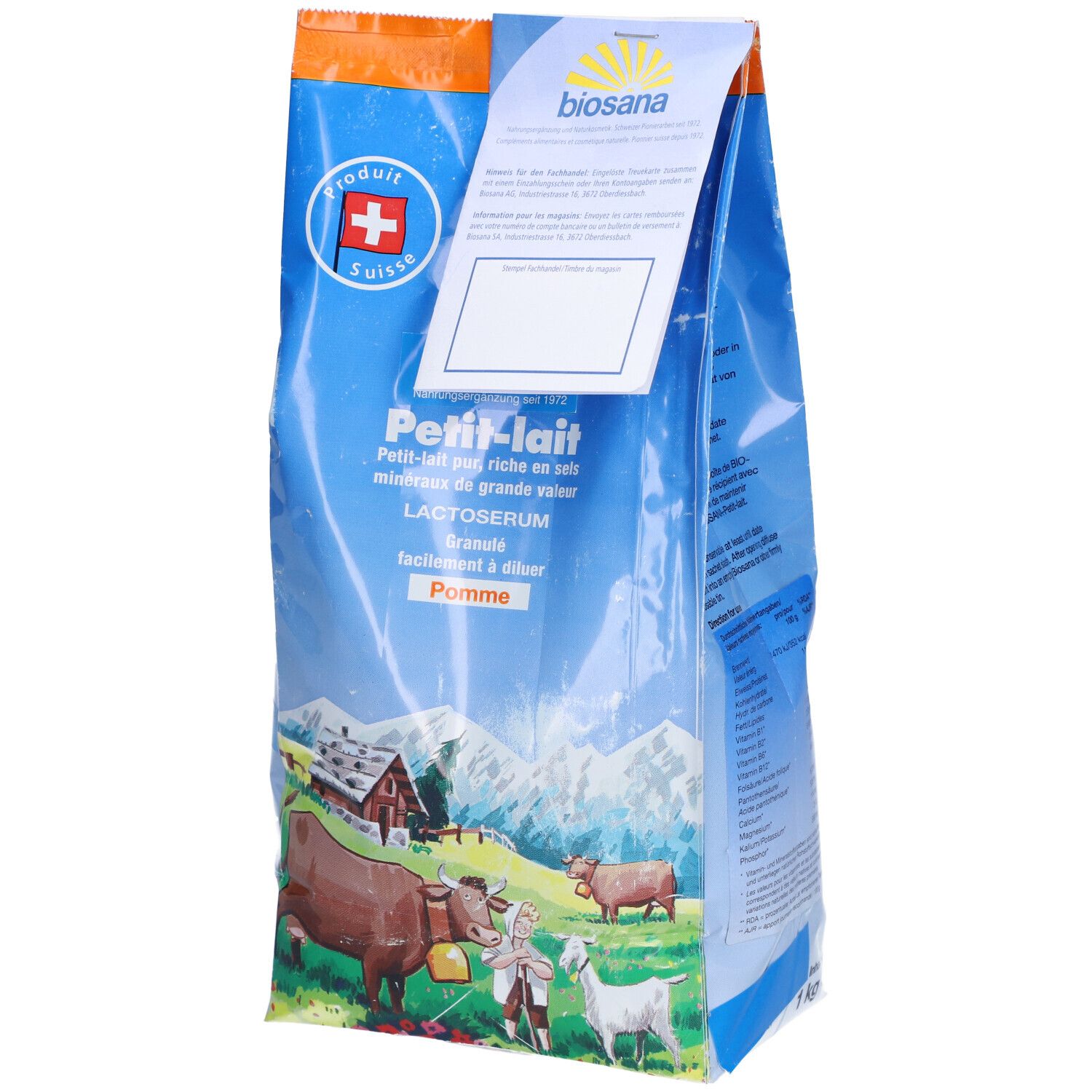 Sachet bleu "Petit-lait", logo croix suisse. Texte: "Pomme", "Granulat". Illustration: vaches, homme, maison.