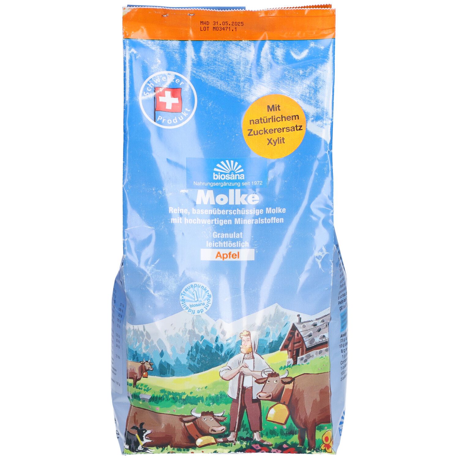 Sachet bleu "Molke", logo croix suisse. Texte: "Apfel", "Granulat". Illustration: vaches, homme, maison.