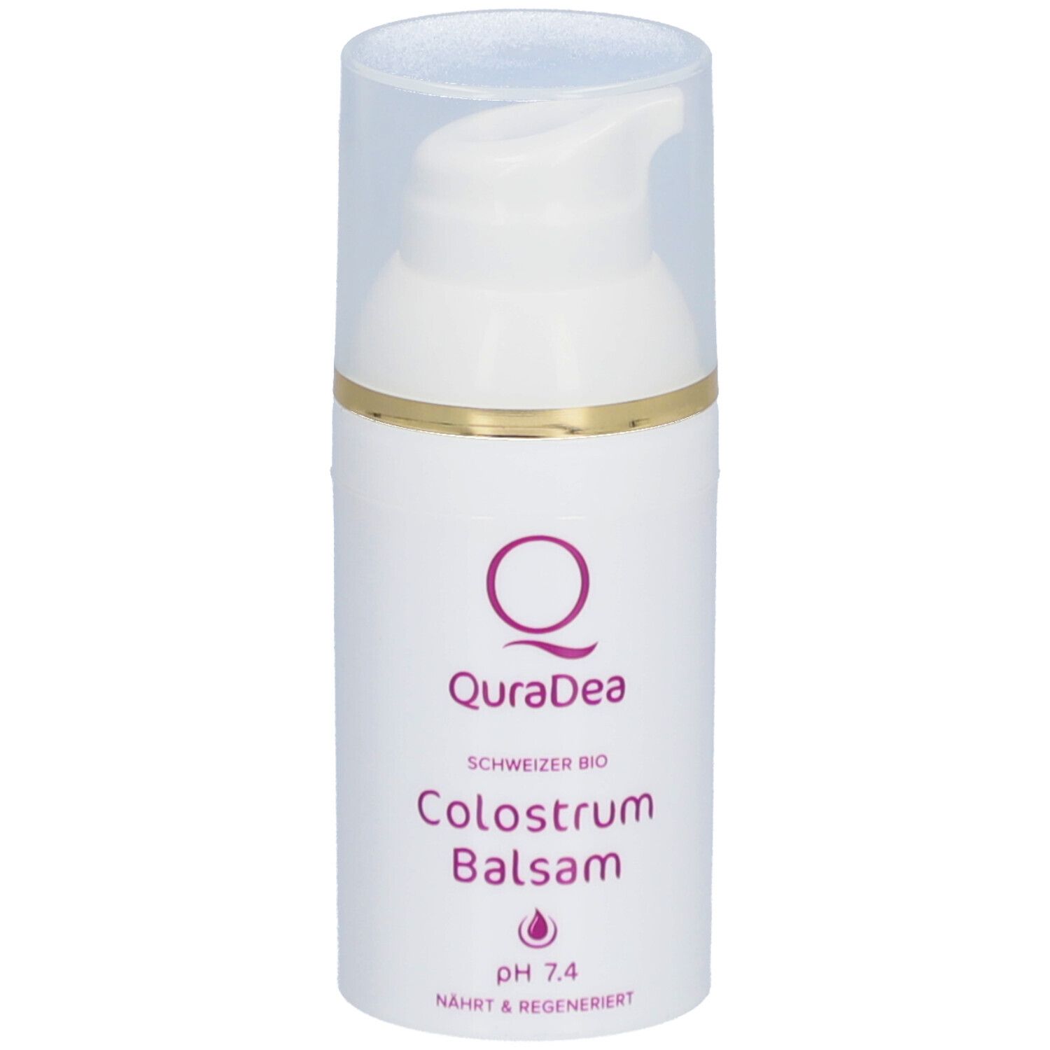 Weißer Spender mit transparentem Deckel. Goldener Ring. Aufschrift: QuraDea, Colostrum Balsam, pH 7.4.