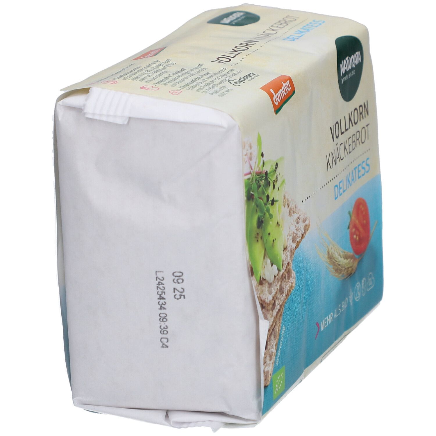 Verpackung von Vollkorn-Knäckebrot, schräg von oben. Aufdrucke: Naturata, Demeter, Vollkorn Knäckebrot Delikatess, Mindesthaltbarkeitsdatum.