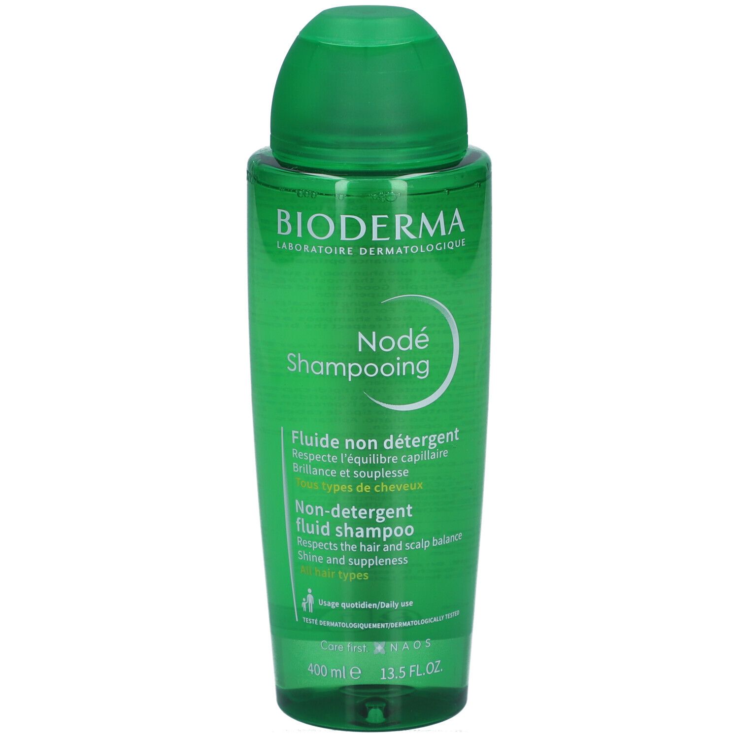 Grüne Flasche mit Shampoo. Aufschrift: BIODERMA, Nodé Shampooing. Flasche mit Klappverschluss. 400 ml.