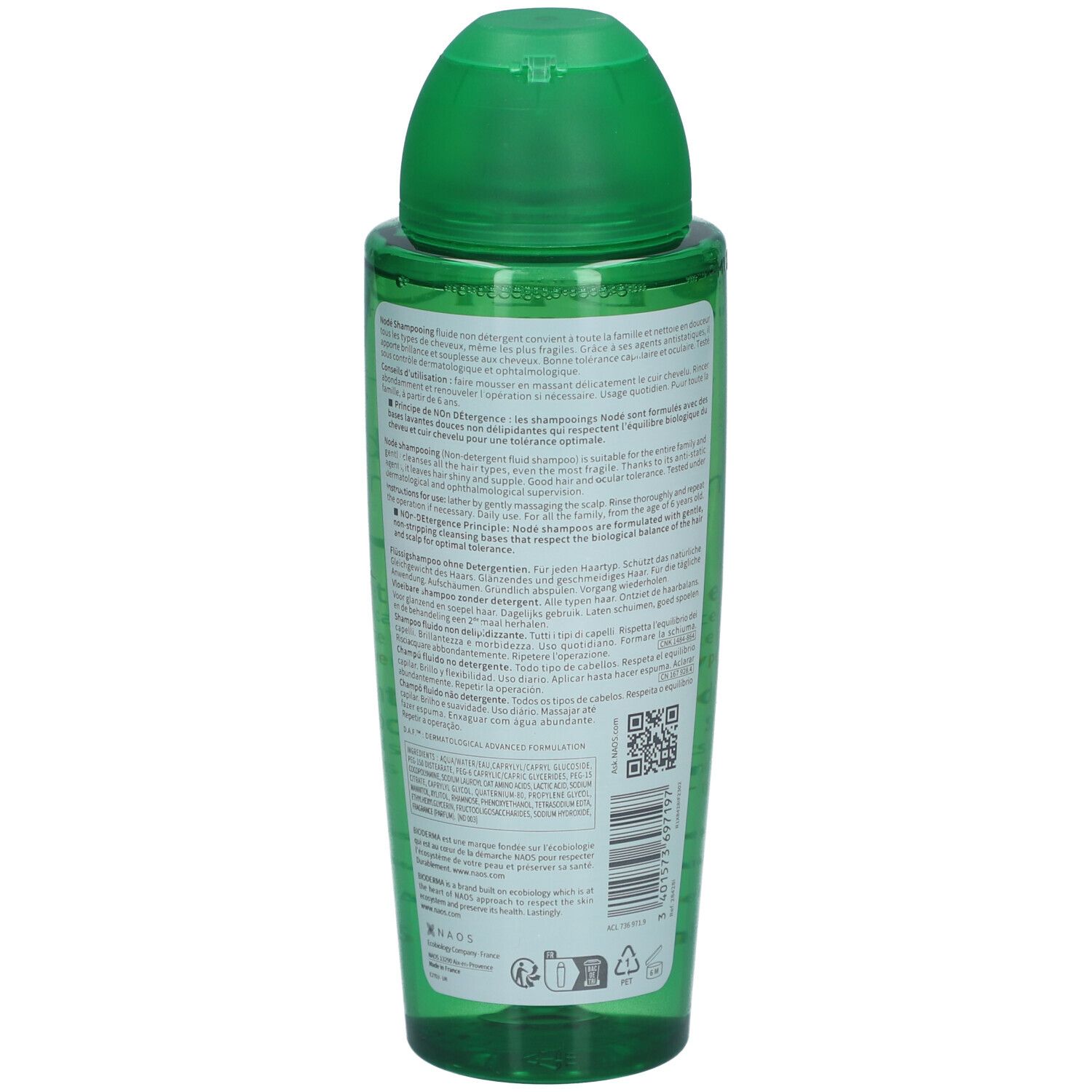Rückseite der grünen Shampoo-Flasche. Text auf dem Etikett. Klappverschluss oben.