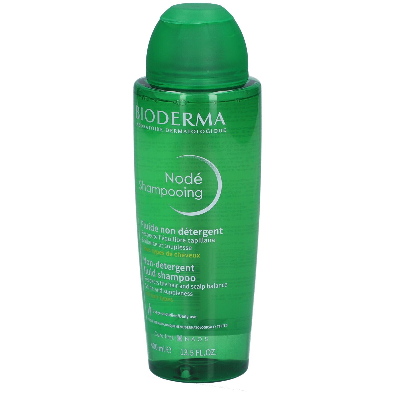 Grüne Shampoo-Flasche. Aufschrift: BIODERMA, Nodé Shampooing. Flasche mit Klappverschluss. 400 ml.