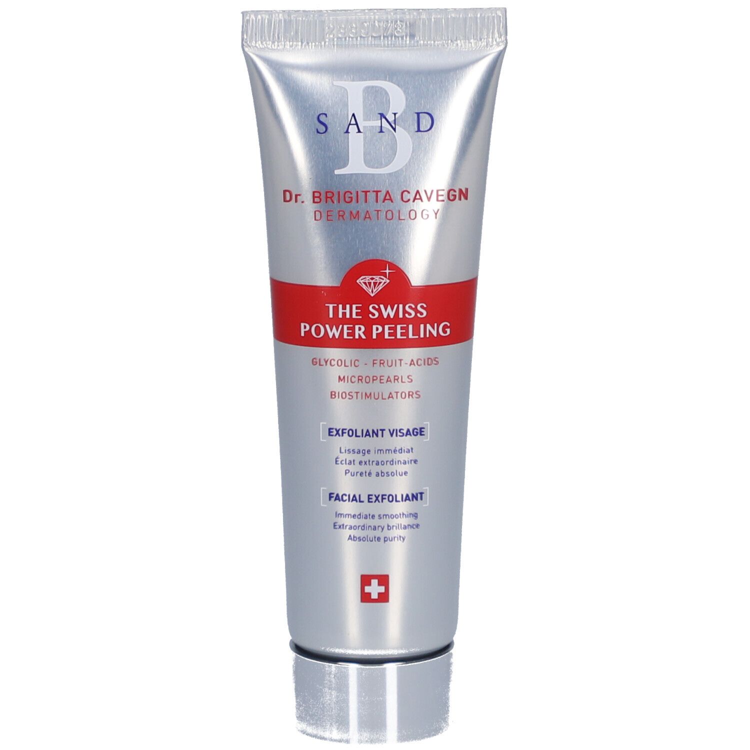 Silberne Tube mit rotem Streifen. Aufschrift: B SAND, Dr. Brigitta Cavegn, THE SWISS POWER PEELING, Exfoliant Visage, Schweizer Kreuz.