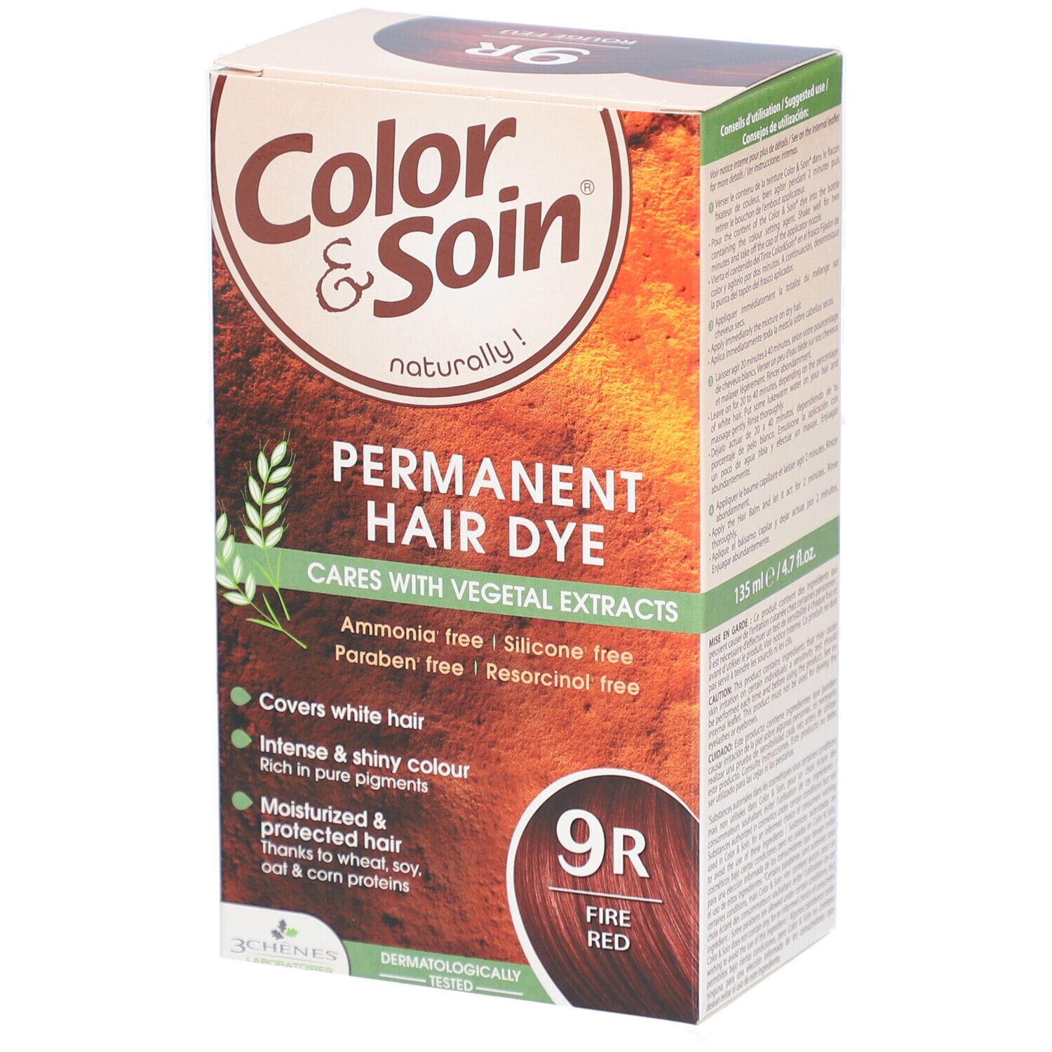 Boîte de coloration capillaire. Inscription : Color & Soin, 9R Rouge Feu. Contient des extraits végétaux. Couvre les cheveux blancs.