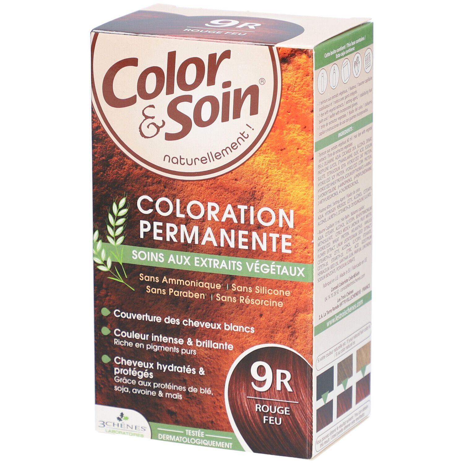 Boîte de coloration capillaire. Inscription : Coloration Permanente, 9R Rouge Feu. Avec extraits végétaux. Couvre les cheveux blancs.