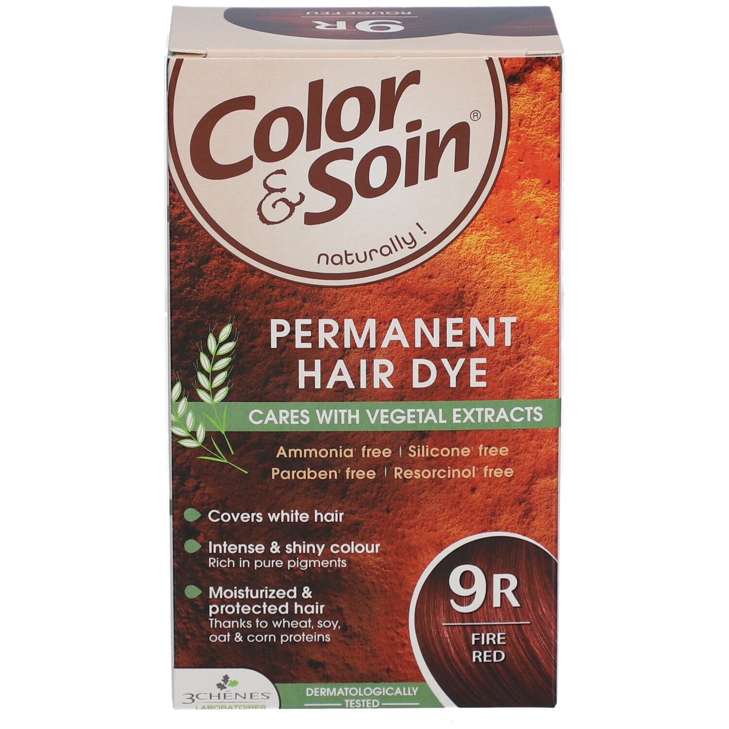 Boîte de coloration capillaire. Inscription : Color & Soin, 9R Rouge Feu. Contient des extraits végétaux. Couvre les cheveux blancs.